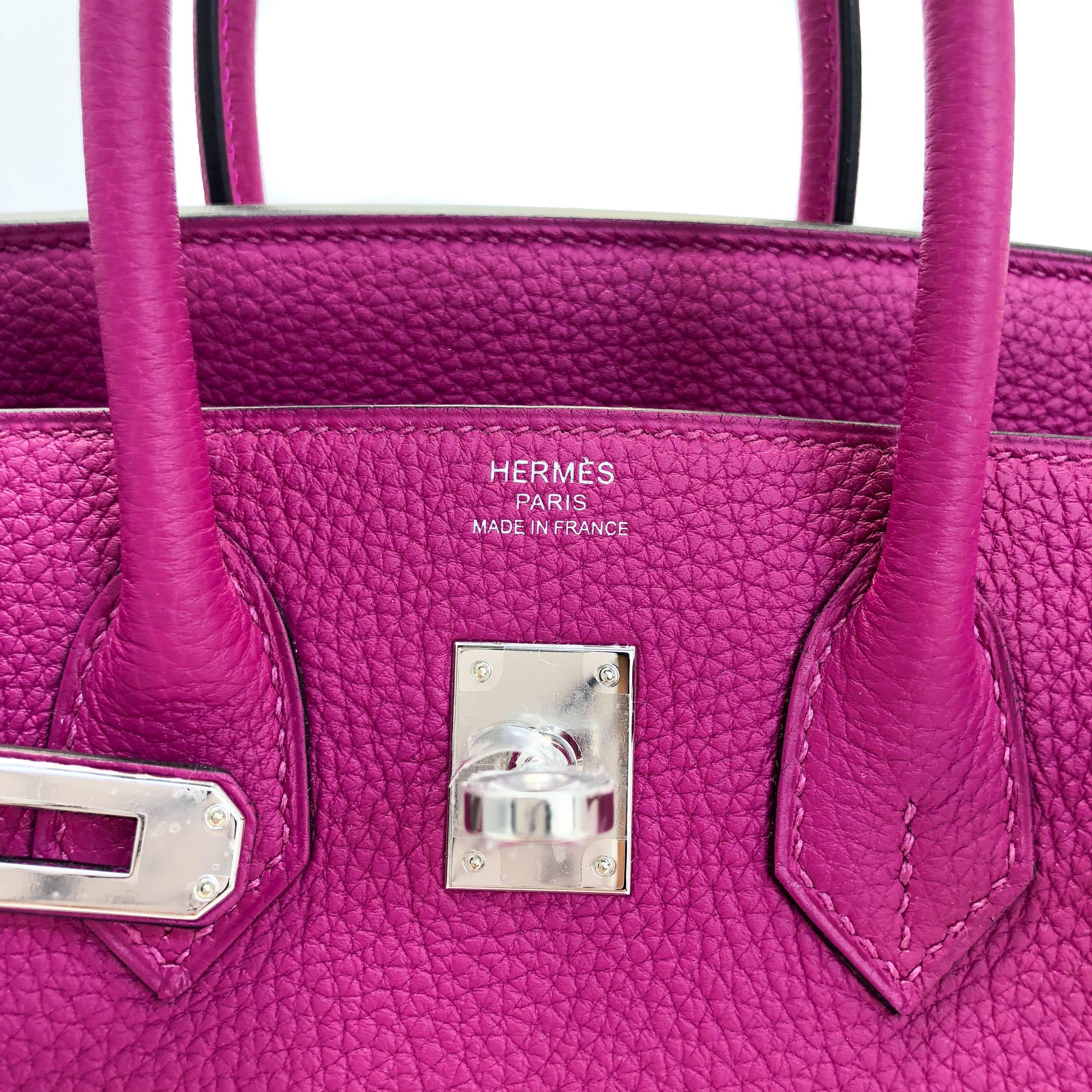 An iconic bag in an unforgettable colour. This Hermes This Birkin 25 Rouge Pourpre with Palladium Hardware is guaranteed to catch attention with its adorable size and classic construction. Guaranteed 100% authentic.

100% authentic: Birkin