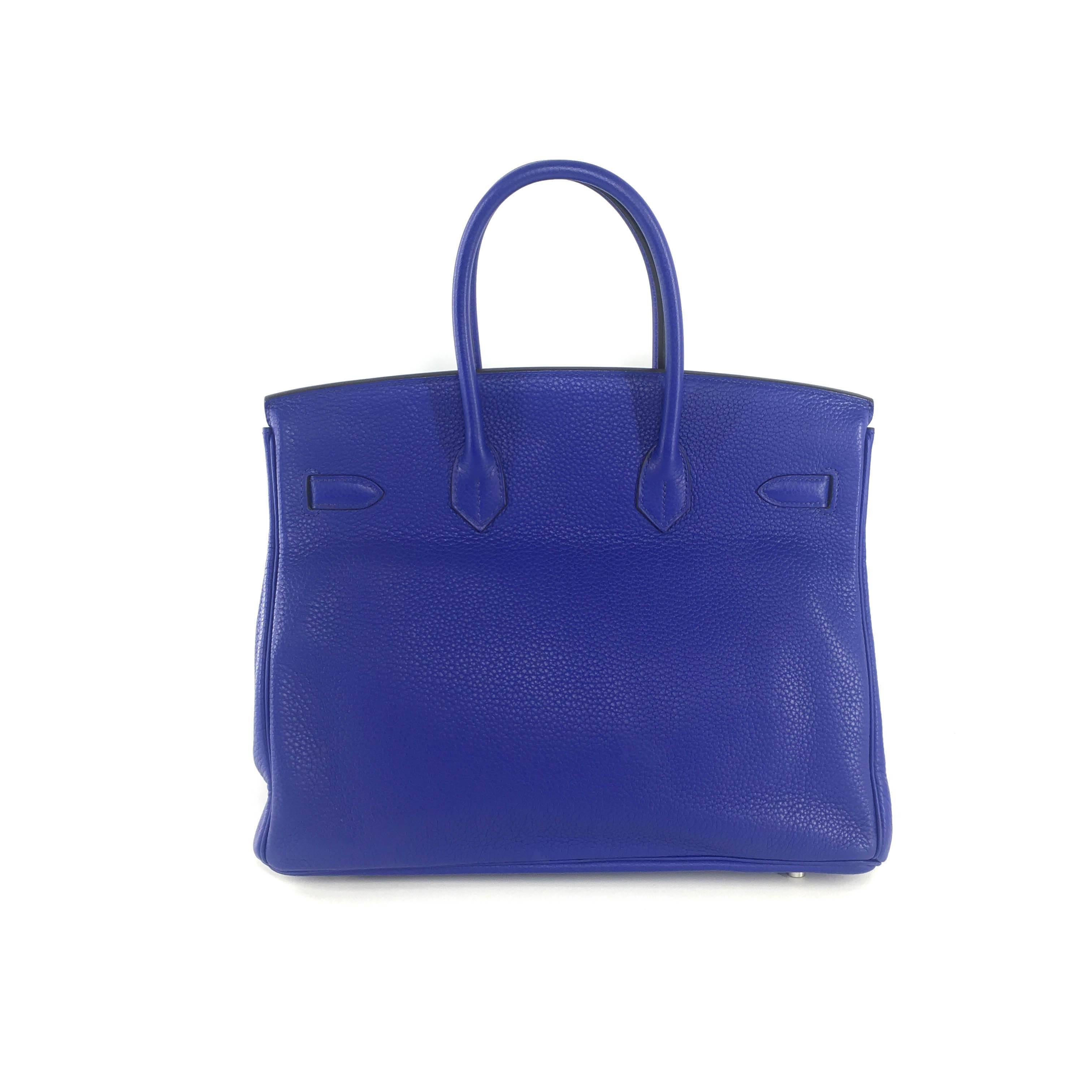 This Hermes Birkin 35 Blue Electric Togo leather with Palladium Hardware bag is guaranteed to catch attention with its colour and classic construction. This bag is guaranteed to be 100% authentic.

Includes: Lock and Keys, Dust Bag, Rain coat,