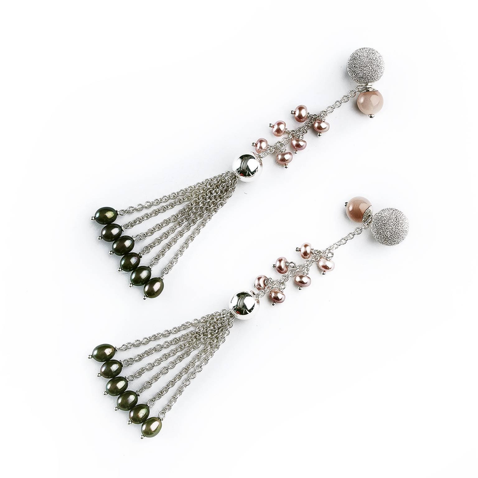 The classic and feminine earrings can warn as a captured through the perfect combination of peach moonstone with pink & black cultured pearls, connected by a sterling silver chain tassel in these stunning two-in-one earrings. The bottom part of the