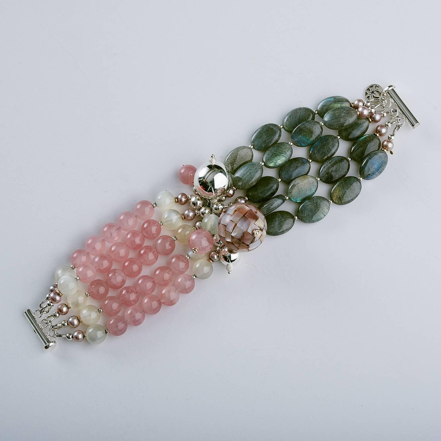 Five strands beaded bracelet created with round Madagascar rose quartz and gray moonstone combination with oval labradorite beads.  Silver accented by shiny multi size beads, 14K yellow roundels and featured pink 20 mm mother of pearls bead and two