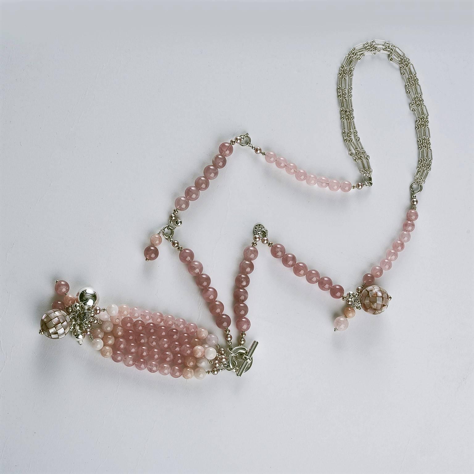 
Grape branch Madagascar rose quartz, morganite & cultured freshwater lavender pearls opera statement tassel necklace.
From three-row sterling silver top chains, six statements of Madagascar rose quartz a graduated from small to large. Cascading