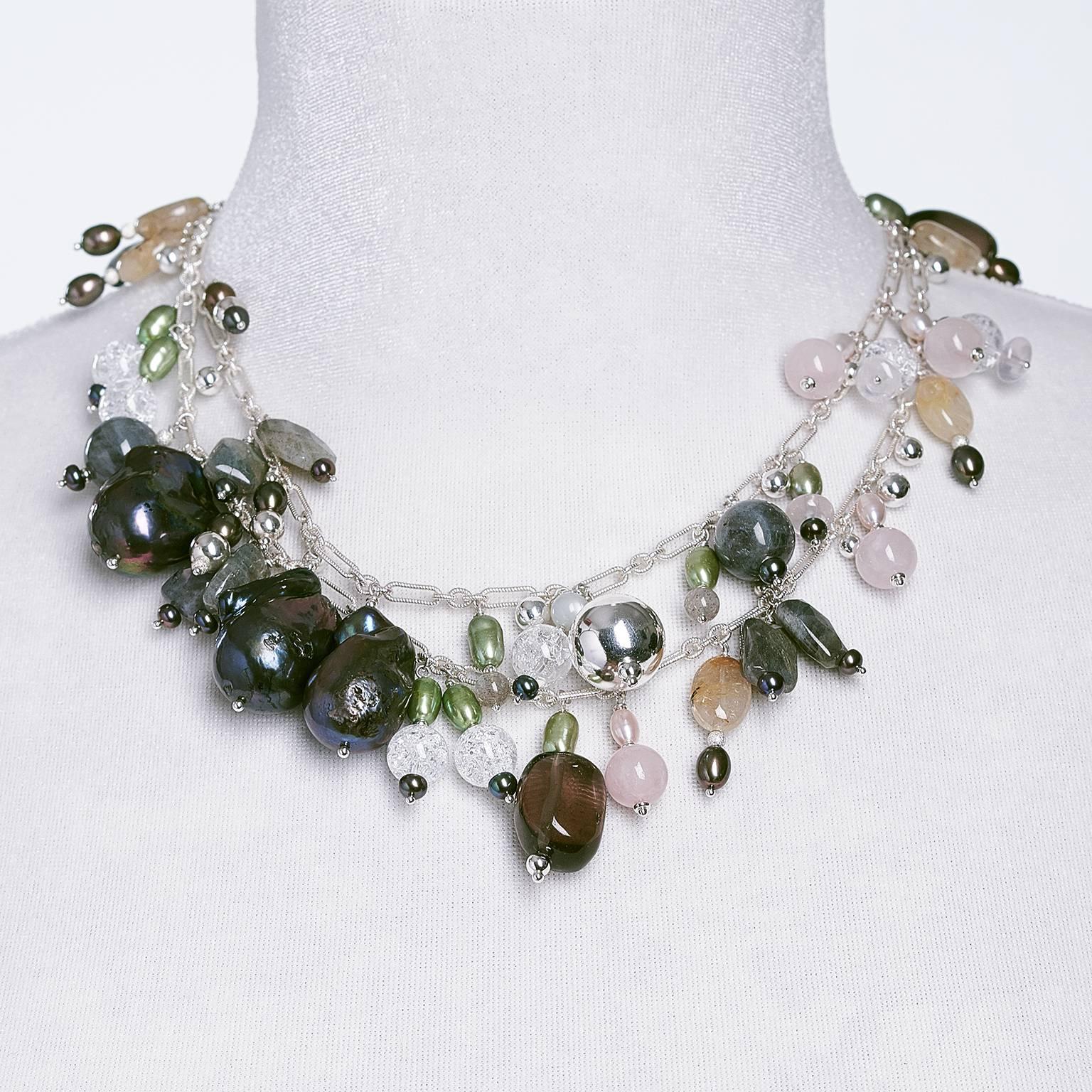 This long silver chain opera drop necklace composed of 45 individually handmade charm beads made of natural gemstones and multicolored pearls emphasized with three large black cultured freshwater baroque pearls measuring  26.20 x 20.50 mm, 28.50 x