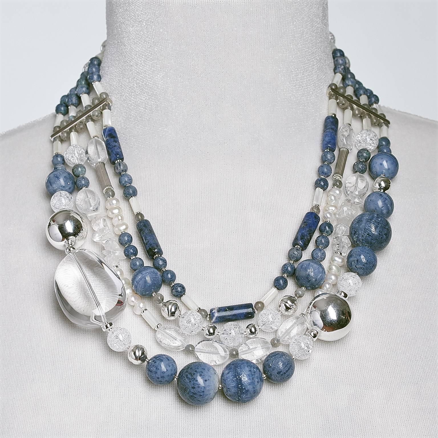 Composed with normal, very light irregularities caused by the natural structure of the Blue Sponge Coral round beads. Sodalite and Mother of Pearl tubes, that contrast beautifully with the large Crystal Nugget and White Cultured Freshwater Pearls.