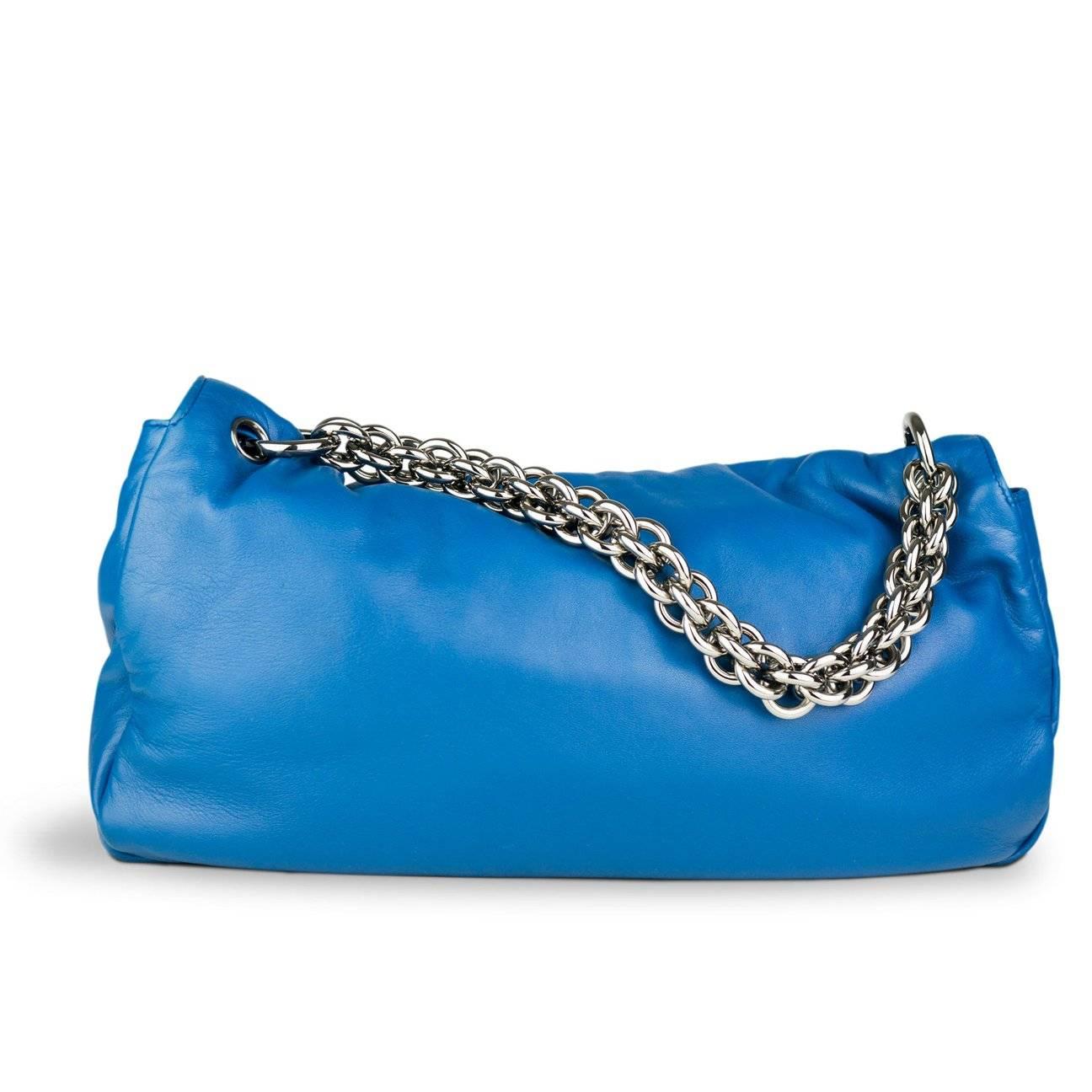 Chanel large blue soft lambskin flap with extra thick chunky chain

Year: 2006
Silver hardware
Classsic CC turnlockclosure
Soft blue lambskin 
Interior center zippered pocket
8”H x 11” W x 3” D
Strap Drop 7”
Made in Italy
Condition: Has been carried