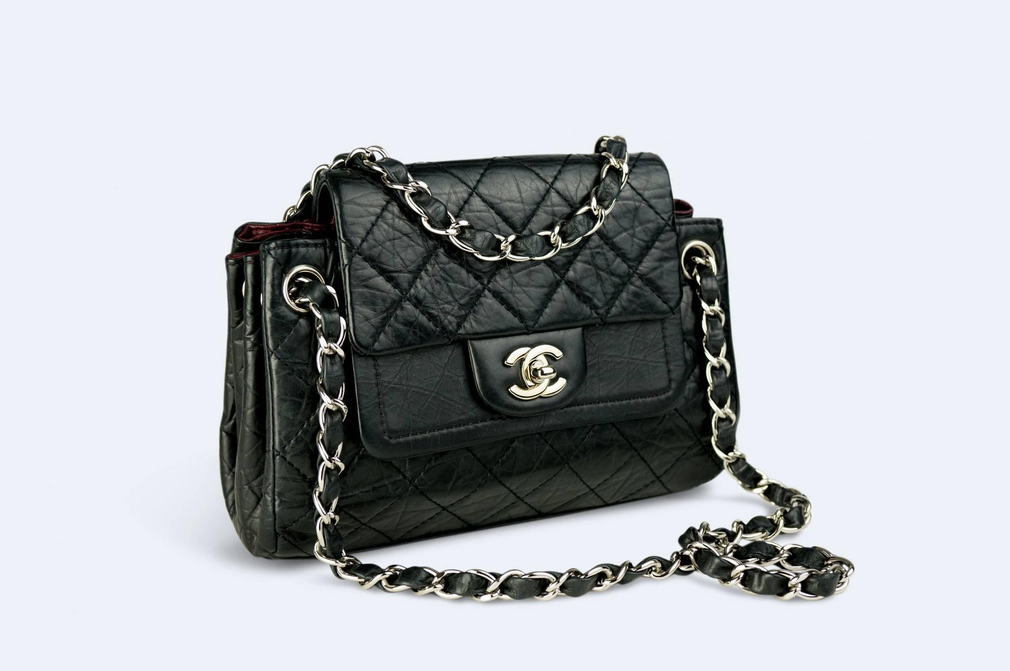 Chanel Calfskin Distressed Classic Limited Edition Double Flap Bag

2006 {VINTAGE 16 Years}
Distressed quilted calfskin leather
Double layer flap closure 
Silver hardware
Classic interowoven calfskin leather chain
CC turnlock
Burgundy lambskin