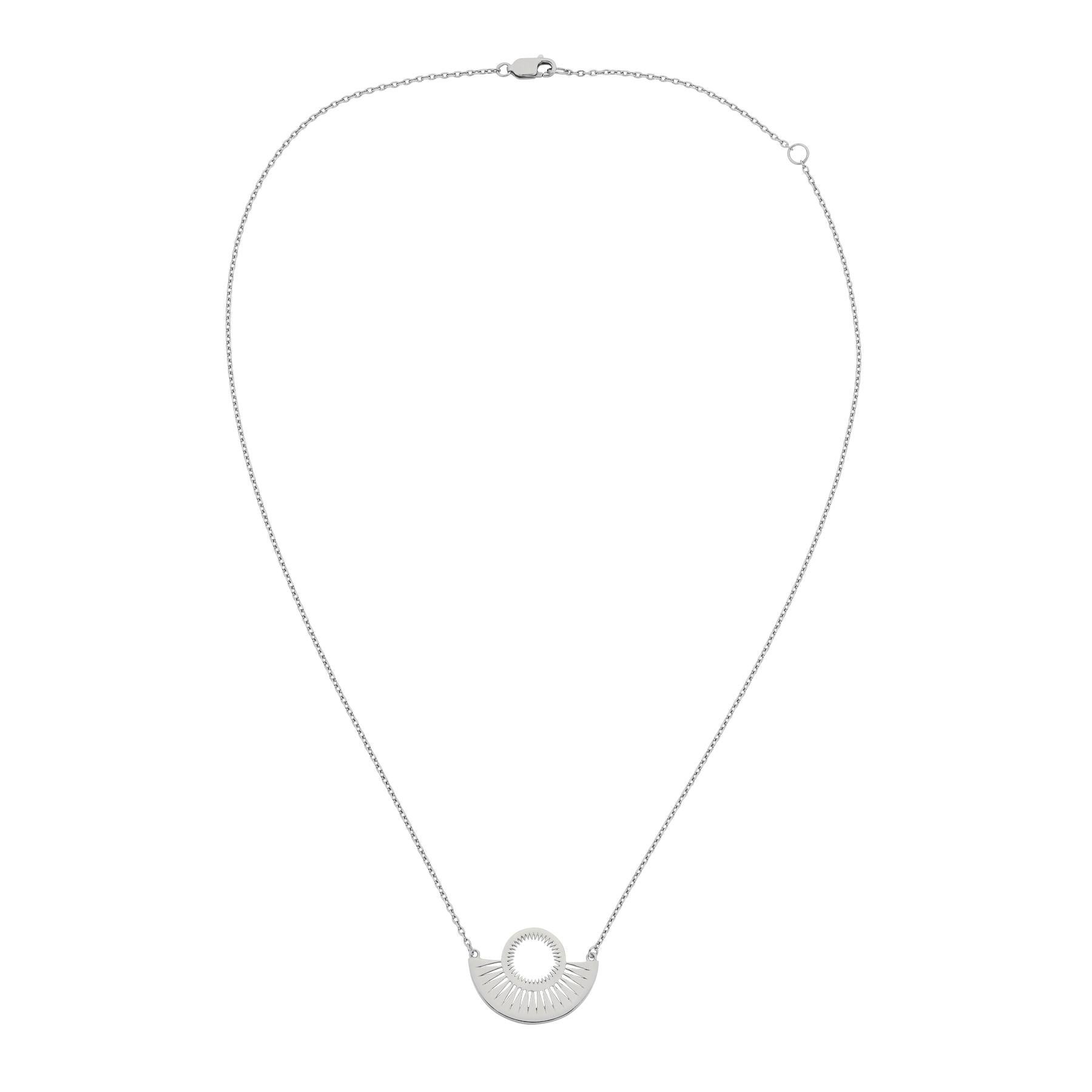 The Pocket Full of Sunshine necklace createa the shapes made by the Sun as it sits over the sea, and the reflections of light cast over the water. The pendant makes a striking statement as the fine cut-out detailing reveals glimpses of skin and