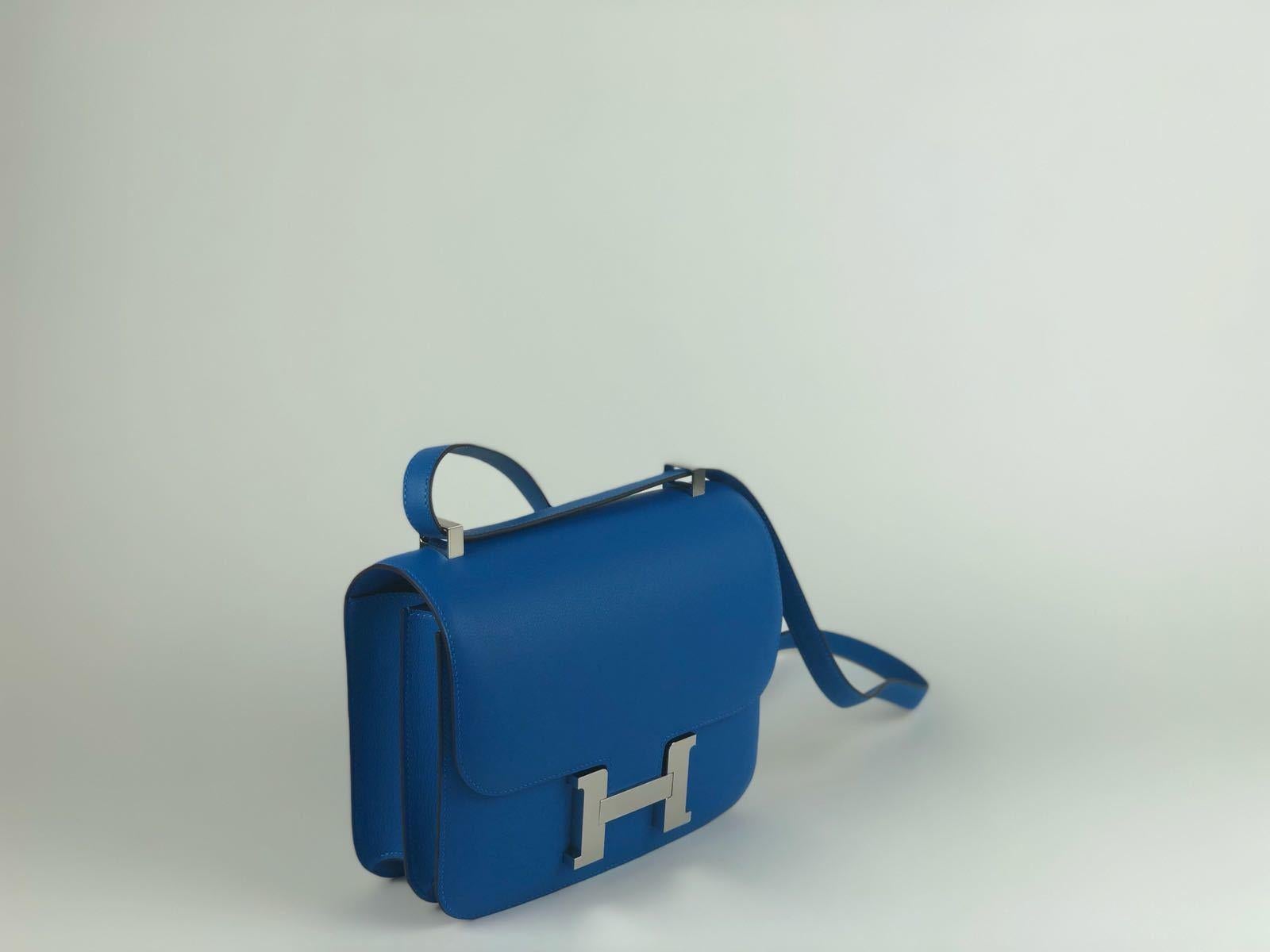 New never worn Hermes Bag
Constance
Size 24
Leather Evercolor
Color Blue Hydra
Palladium hardware

Comes full set: 
Original box
Invoice
Raincoat
Padlock & Keys
Dustbag