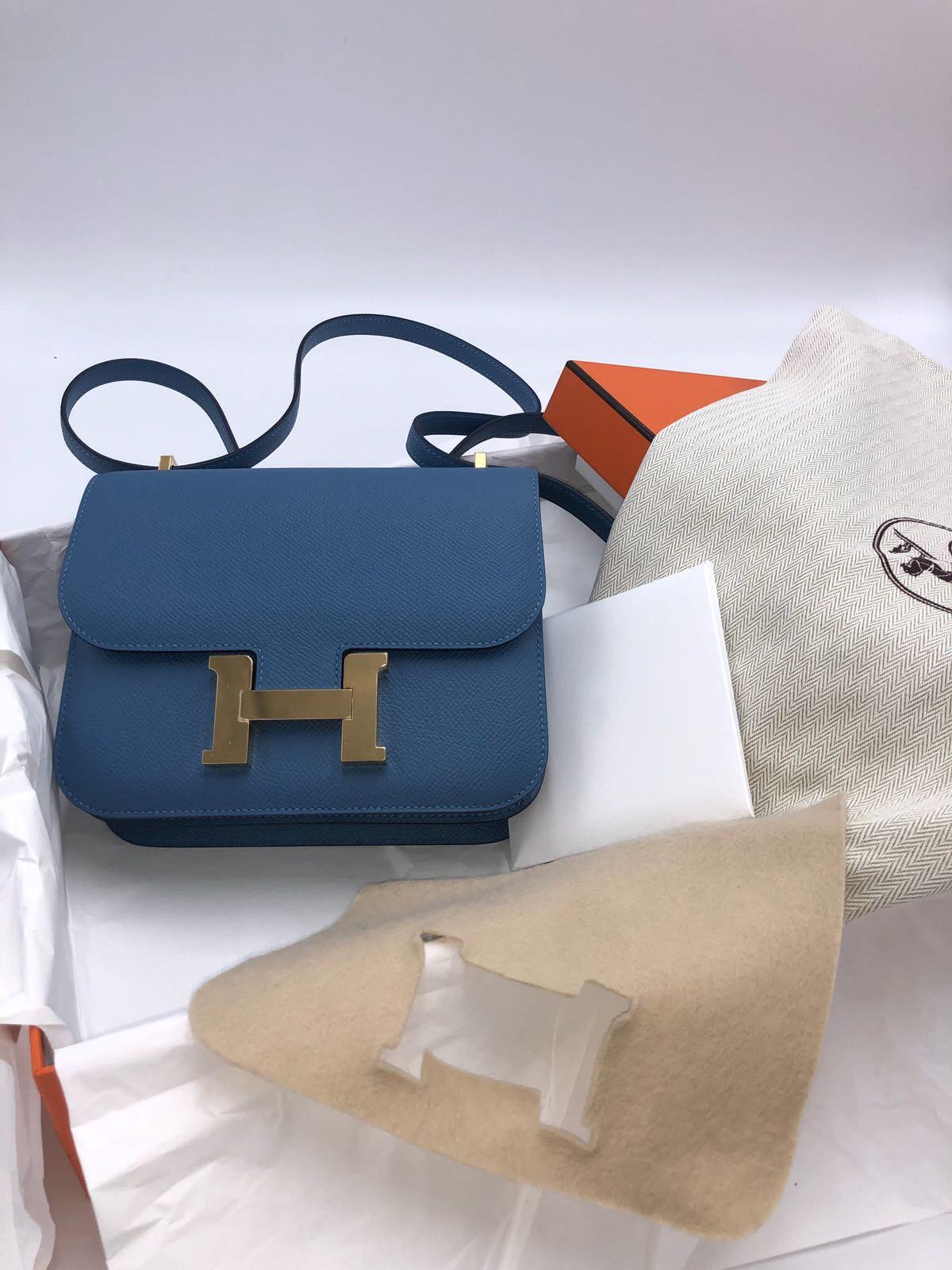 New never worn Hermes Bag
Constance
Size mini
Leather Epsom
Color Blue Azur
Gold hardware

Comes full set: 
Original box
Invoice
Dustbag