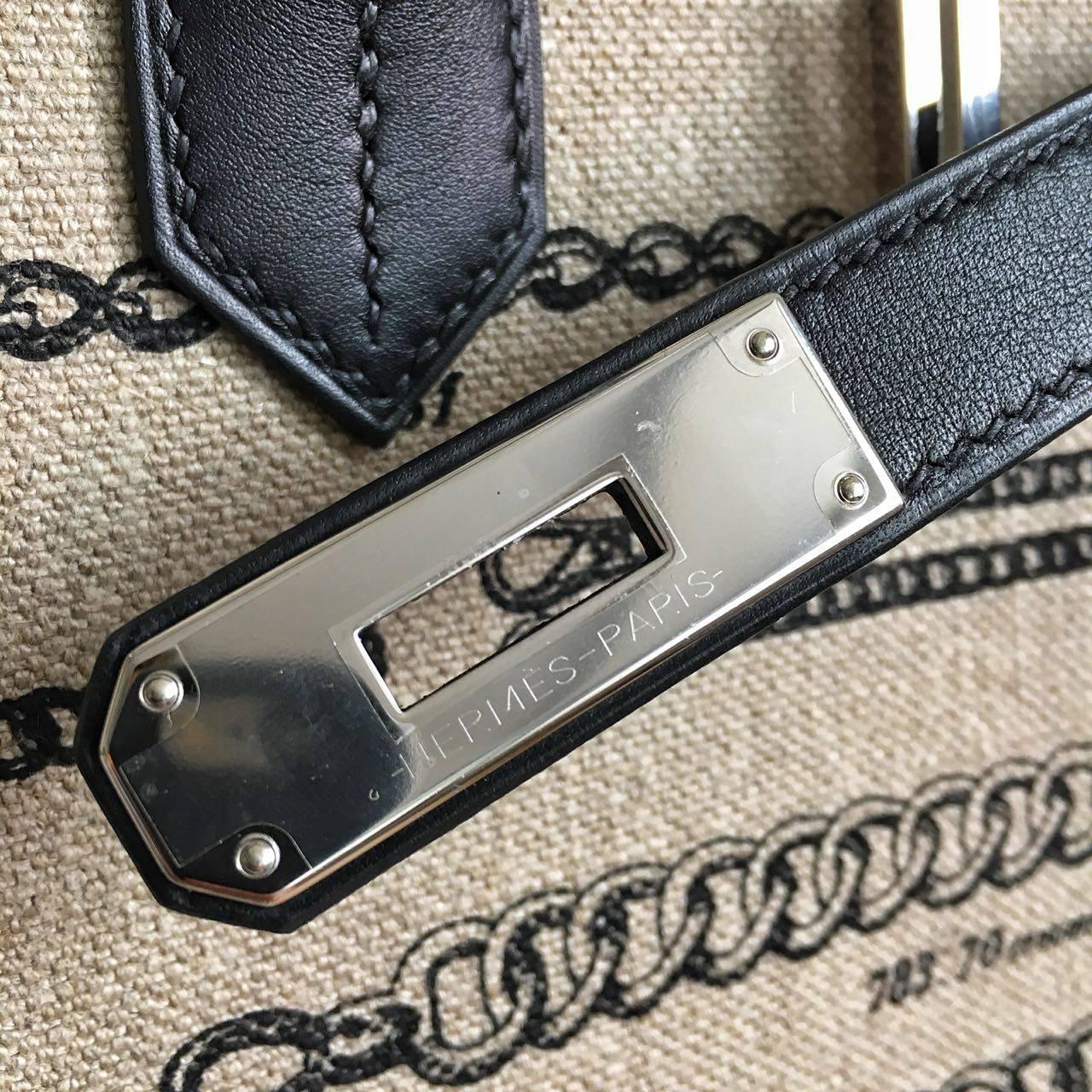 New never worn Hermes Bag
Birkin
Size 35
Limited Toile De Camp Dechainee/Swift Ficelle-Noir/Noir
Palladium hardware

Comes full set: 
Original box
Invoice
Raincoat
Padlock & Keys
Dustbag
