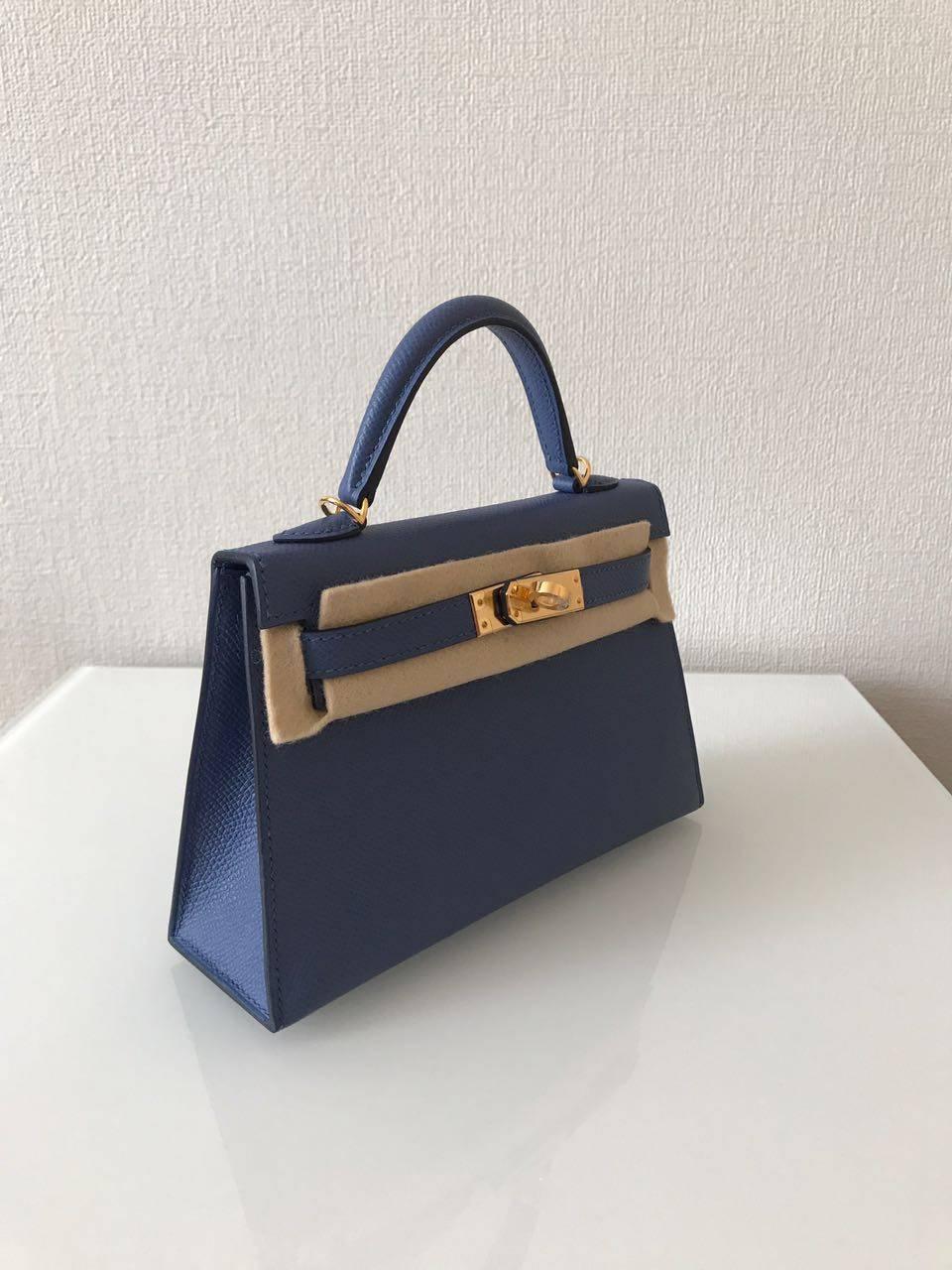 New never worn Hermes Bag
Kelly
Size 20
Leather Epsom
Color Blue Brighton
Gold hardware

Comes full set: 
Original box
Invoice
Raincoat
Padlock & Keys
Dustbag
