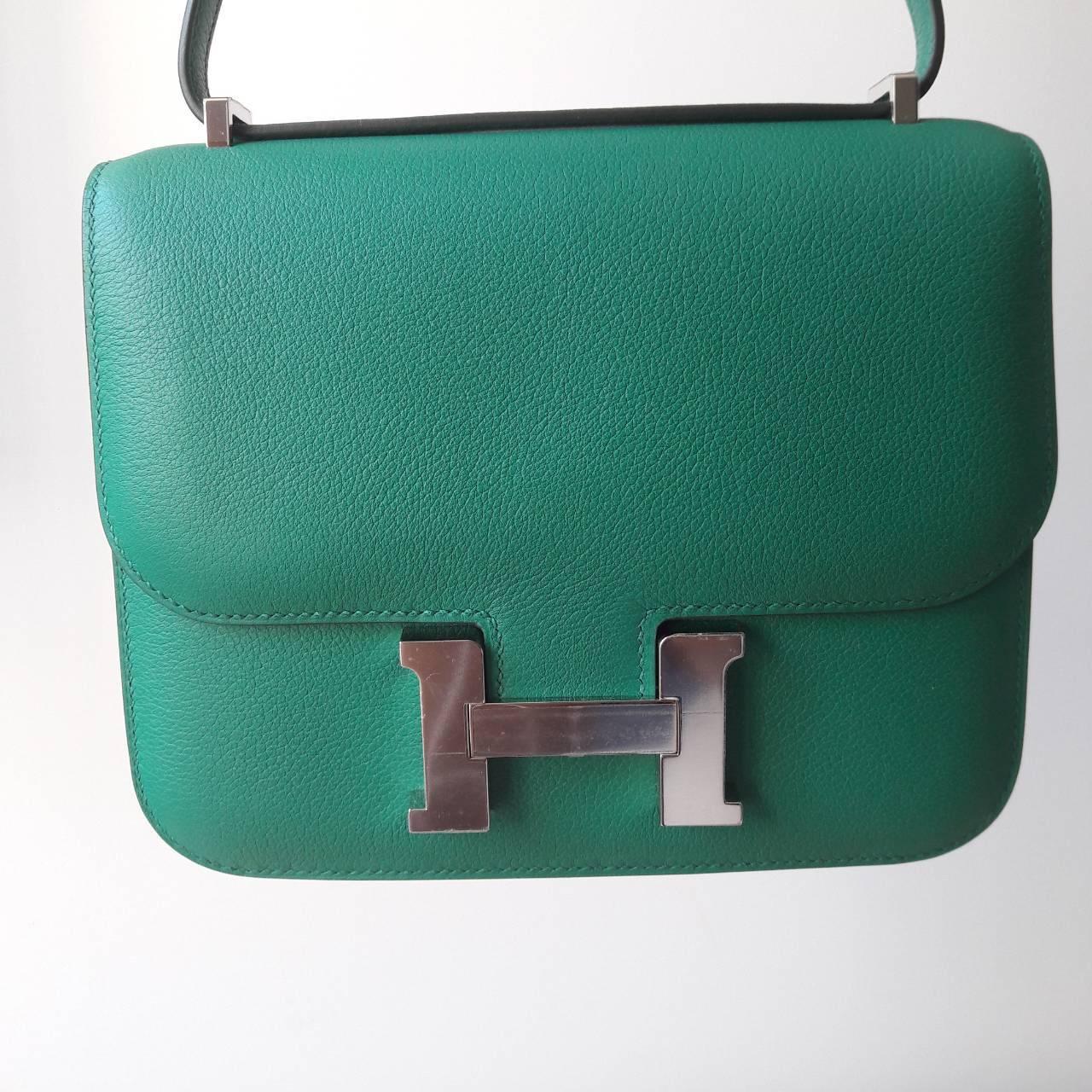 New never worn Hermes Bag
Constance
Mini
Leather Evercolor
Color Vert Vertigo
Palladium hardware

Comes full set: 
Original box
Invoice 2018
Raincoat
Padlock & Keys
Dustbag
C stamp