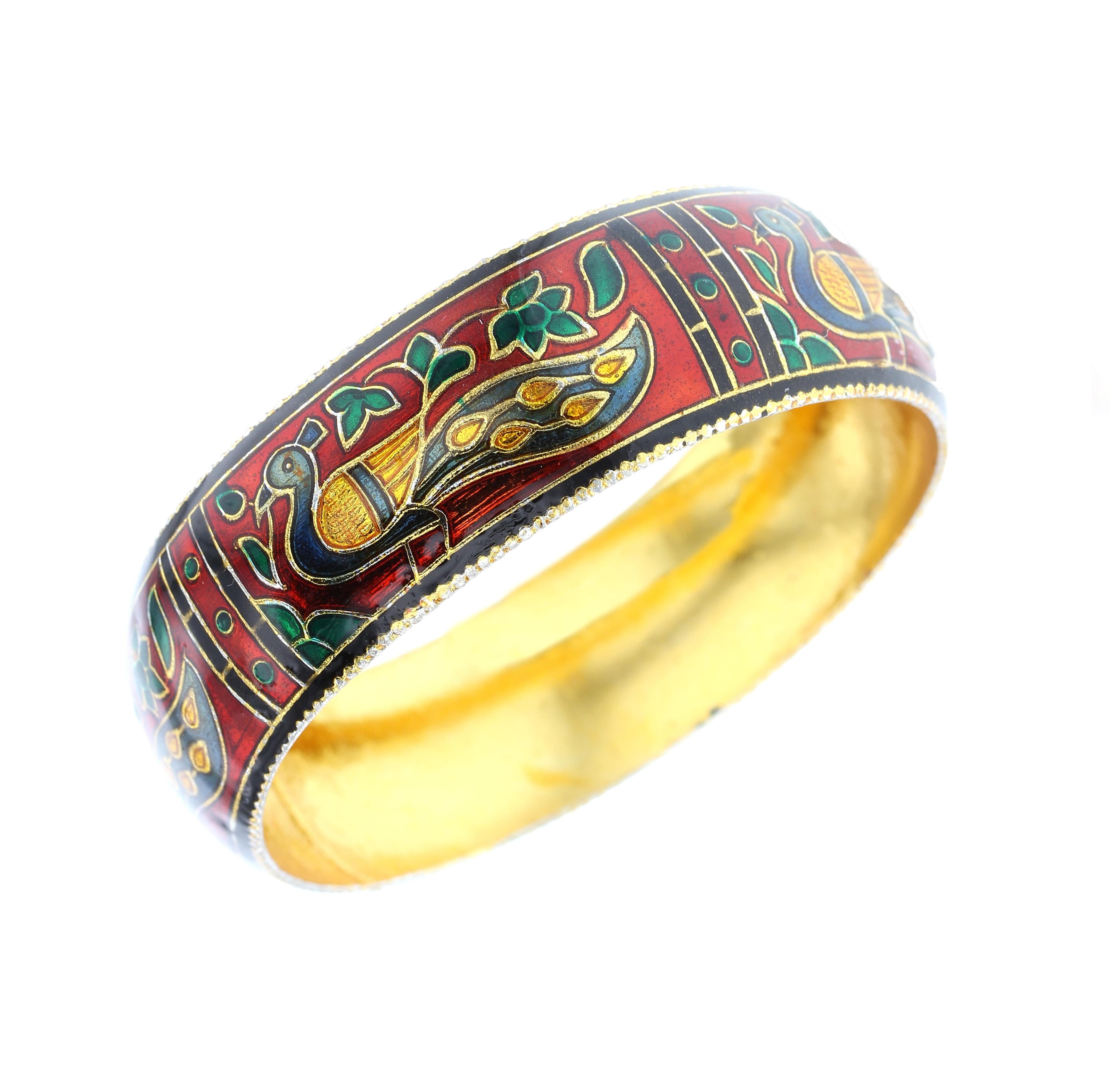 A beautiful and elegant bangle/bracelet with an peacock and floral design in enamel. Inner Diameter: 2.50