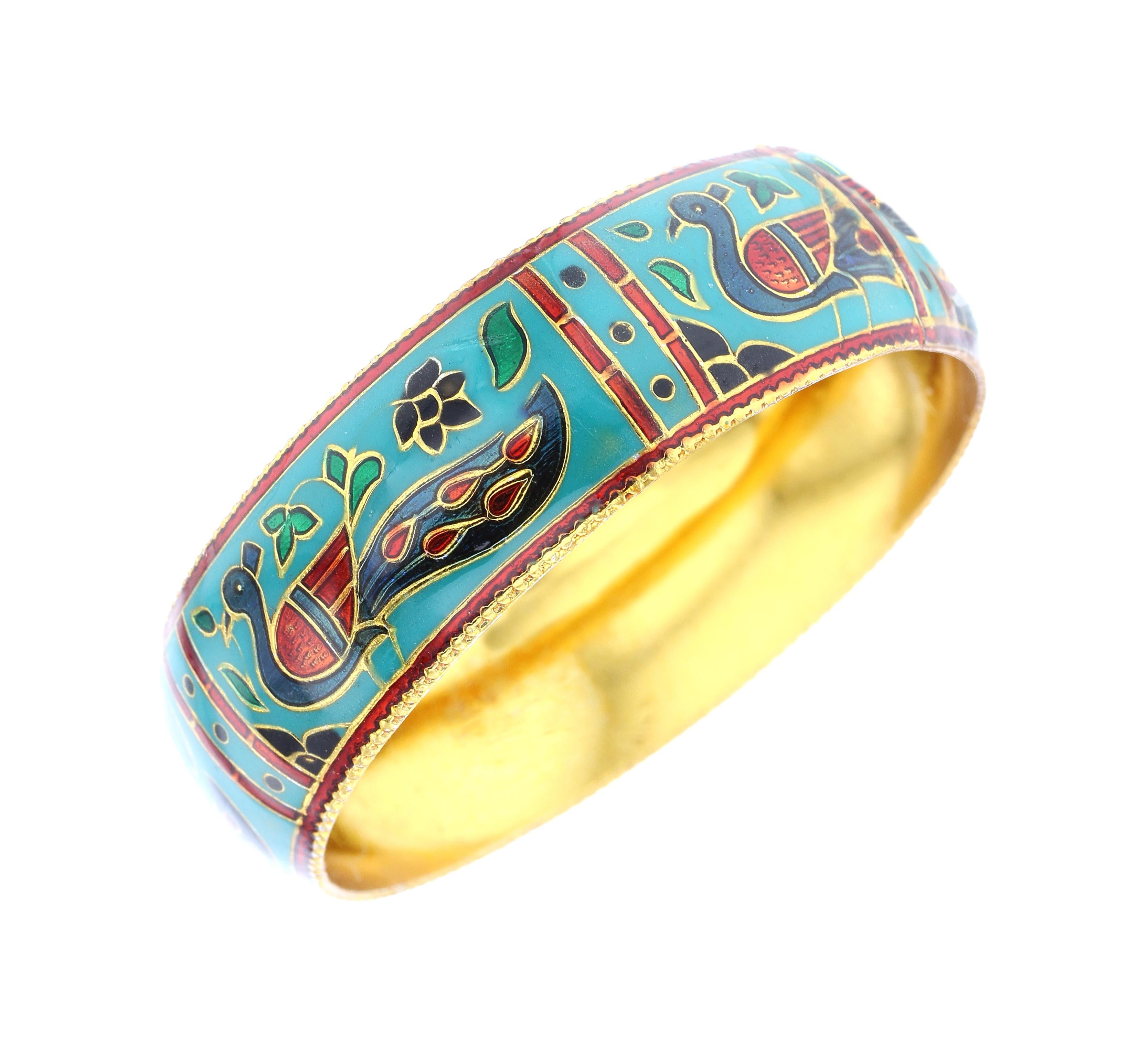 A beautiful and elegant bangle/bracelet with an peacock and floral design in enamel. Inner Diameter: 2.50