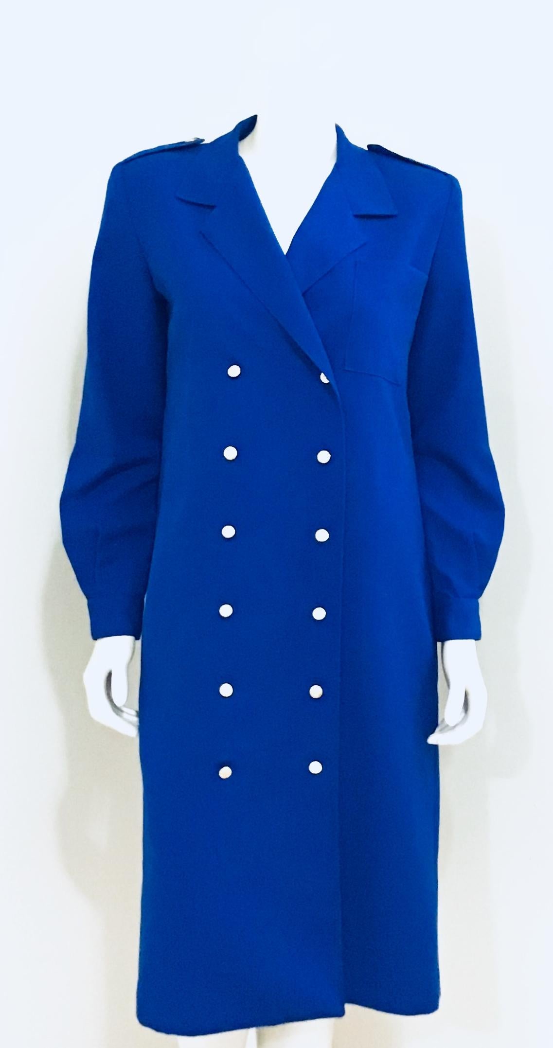 This Royal Blue dream fits like all things from Diane Von Furstenberg, comfortable. Wear with or without the belt, even wear open as a shirt jacket. It has gold buttons that gives the perfect added simple elegance. The classic double breasted style