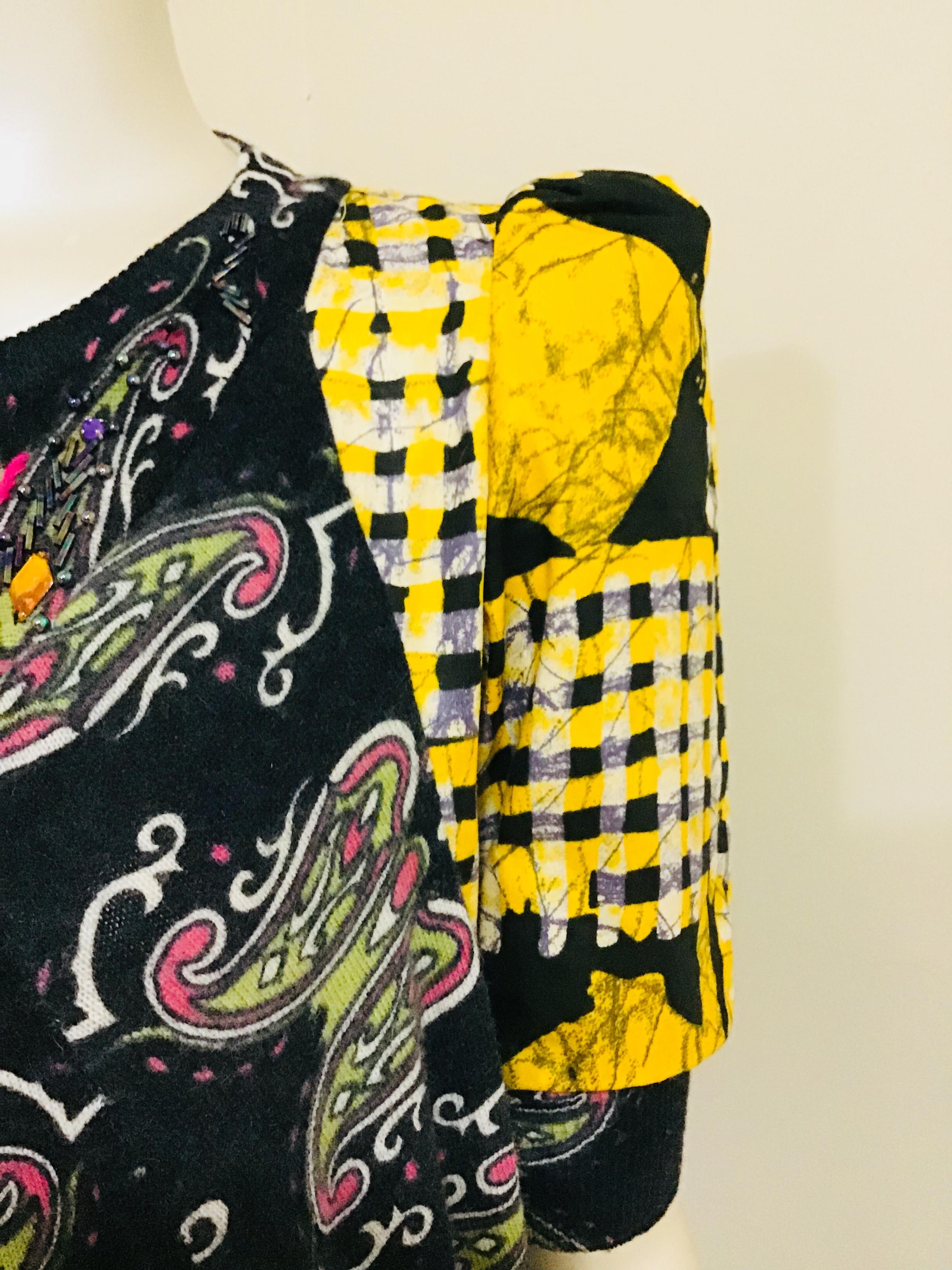 Stand out in this super mini dress or top! The bold yellow from the ethnic print blended with a vintage beaded print sweater creates this very unique silhouette that demands attention. Wear as a super mini with an opaque tight and ankle boot or with