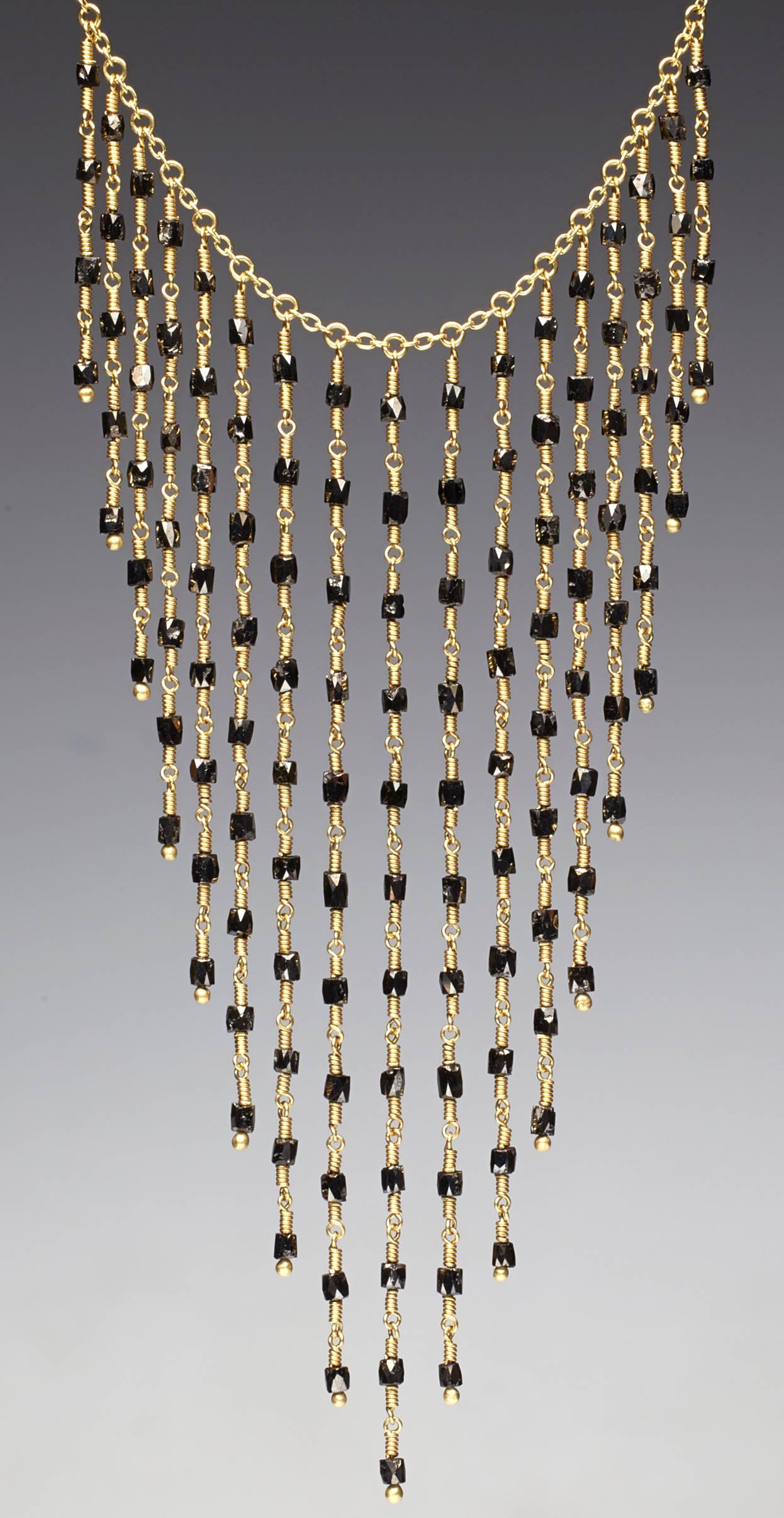 Black diamond bead 18K gold necklace by NYC goldsmith Christopher Phelan. The hex cut beads have six even cut sides to reflect the light. Diamond weight 12.15 carats. Diameter of necklace is 3 x 3.5 inches. Length of necklace 19.75 inches.