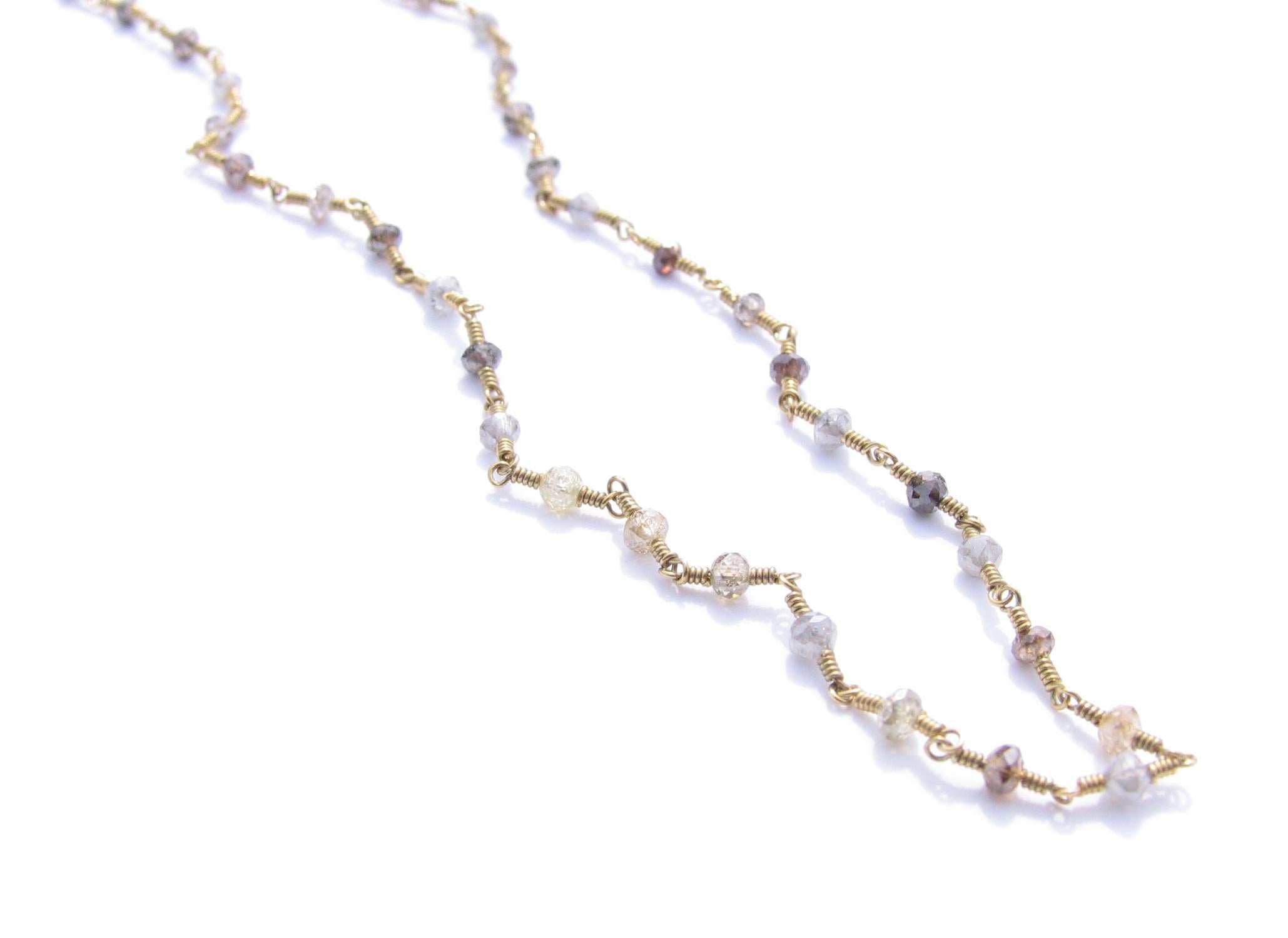 Multicolor faceted diamond bead 18K gold necklace by Christopher Phelan Fine Jewelry. 
Diamond weight 4.09 carats. Approximate size of diamonds is from 2.5 mm to 2 mm. Natural diamonds no enhancements.
Length of necklace 16 ¾ inches.
