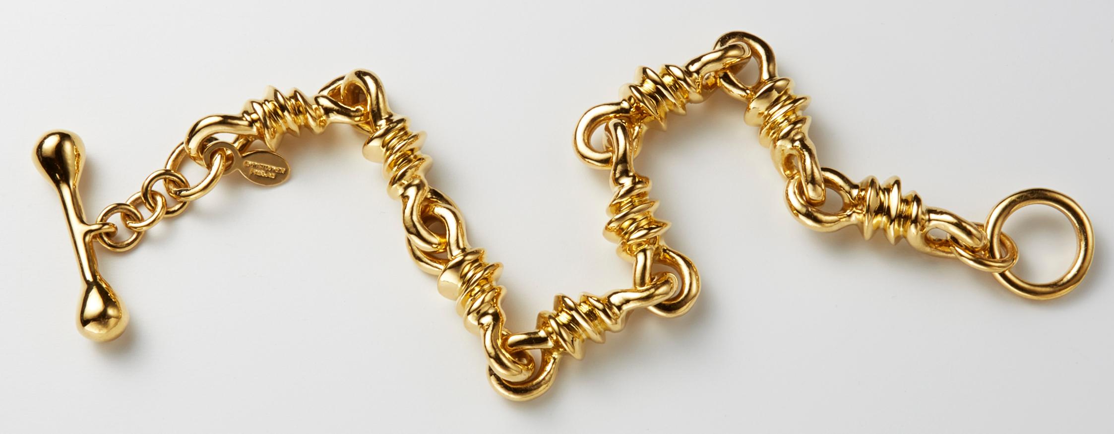 Twisted vine 22K gold bracelet. Dimension of bracelet 9.5 mm wide or .34 inches wide. Weight 3.52 ounces. Bracelet length size 8 ½ inches. Can be sized to any length.
Hand made by goldsmith Christopher Phelan.


