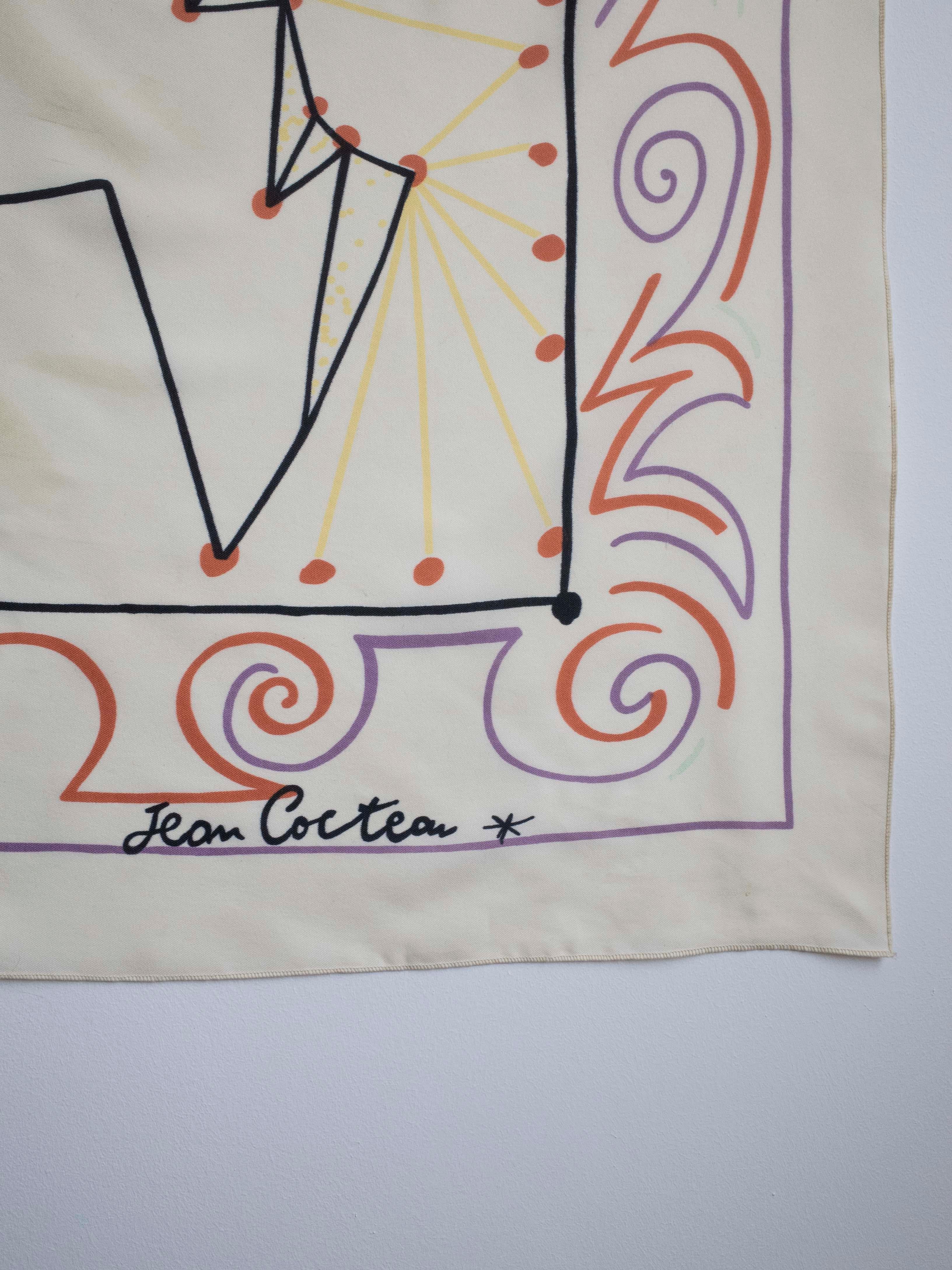 Collectible scarf by the artist Jean Cocteau. Features an abstract profile of a face with dynamic lines and swirls.Labeled.

Measures 29” square,Printed 