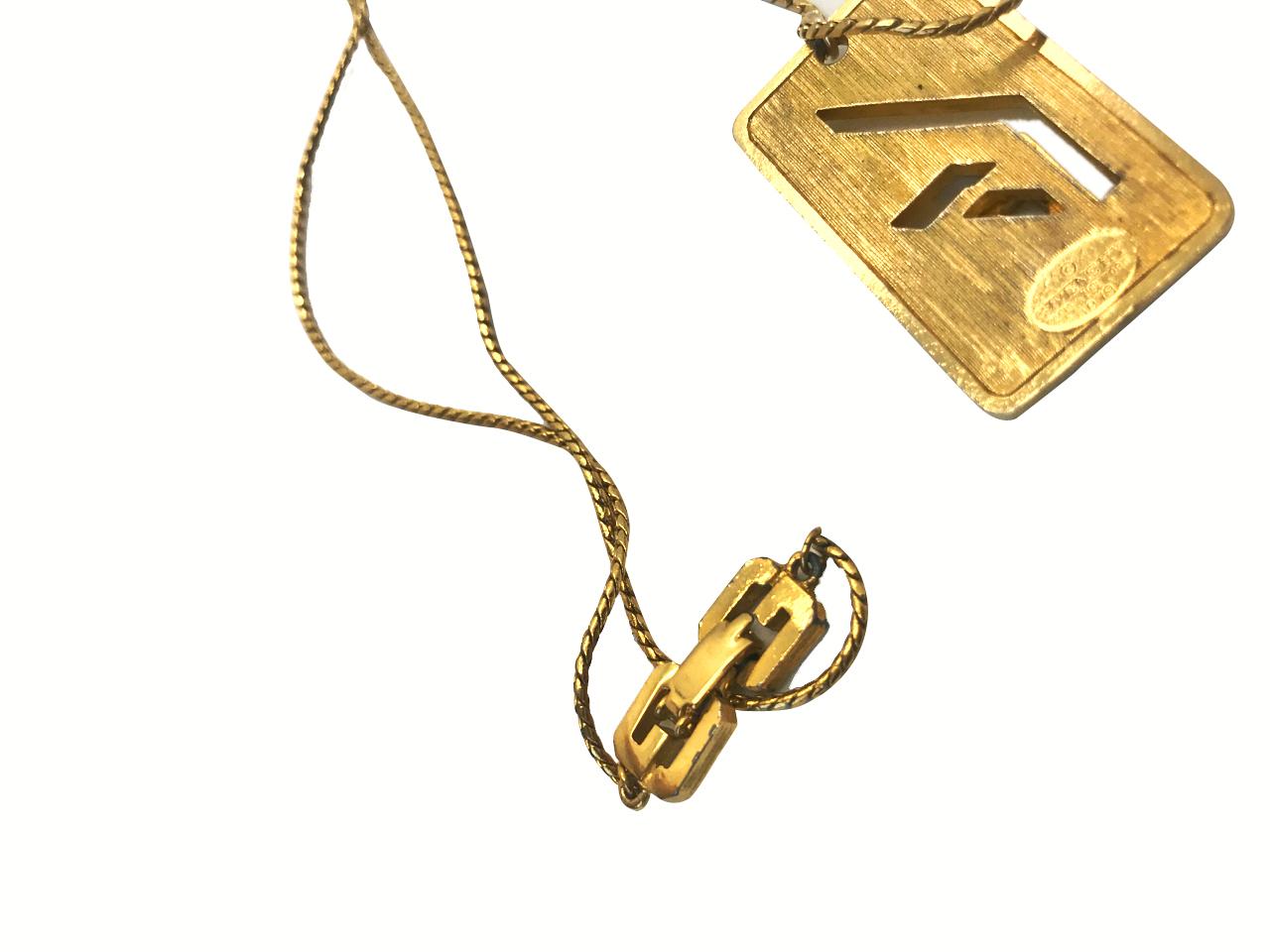 Women's or Men's Givenchy 1970s Gold Plated G Logo Pendant Necklace   For Sale