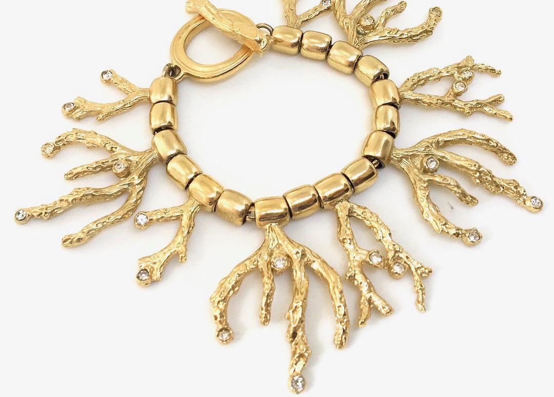 Yves Saint Laurent YSL 1970s Vintage Goosens Coral Gold Plated Bracelet. 

Rare, collectable statement bracelet created by the late great Monsieur Bijou Robert Goosens, this exquisite bracelet with it's classic Goosens organic form is inspired by