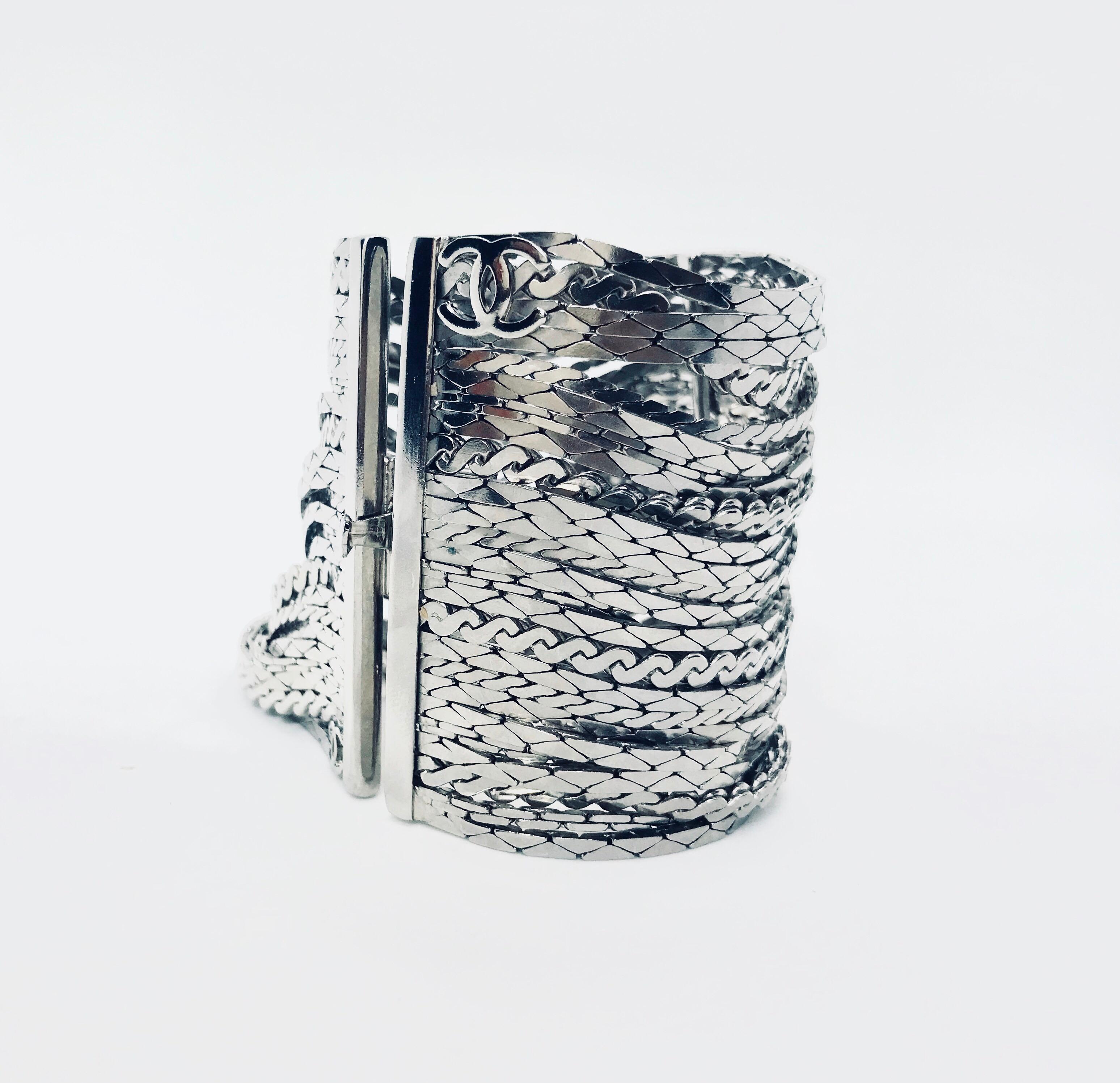 Chanel 90s Silver Plated Multi Strand Cuff Bracelet. From the Spring 1998 collection.

Designed to drape beautifully from the arm.

Measurements: 
6.75