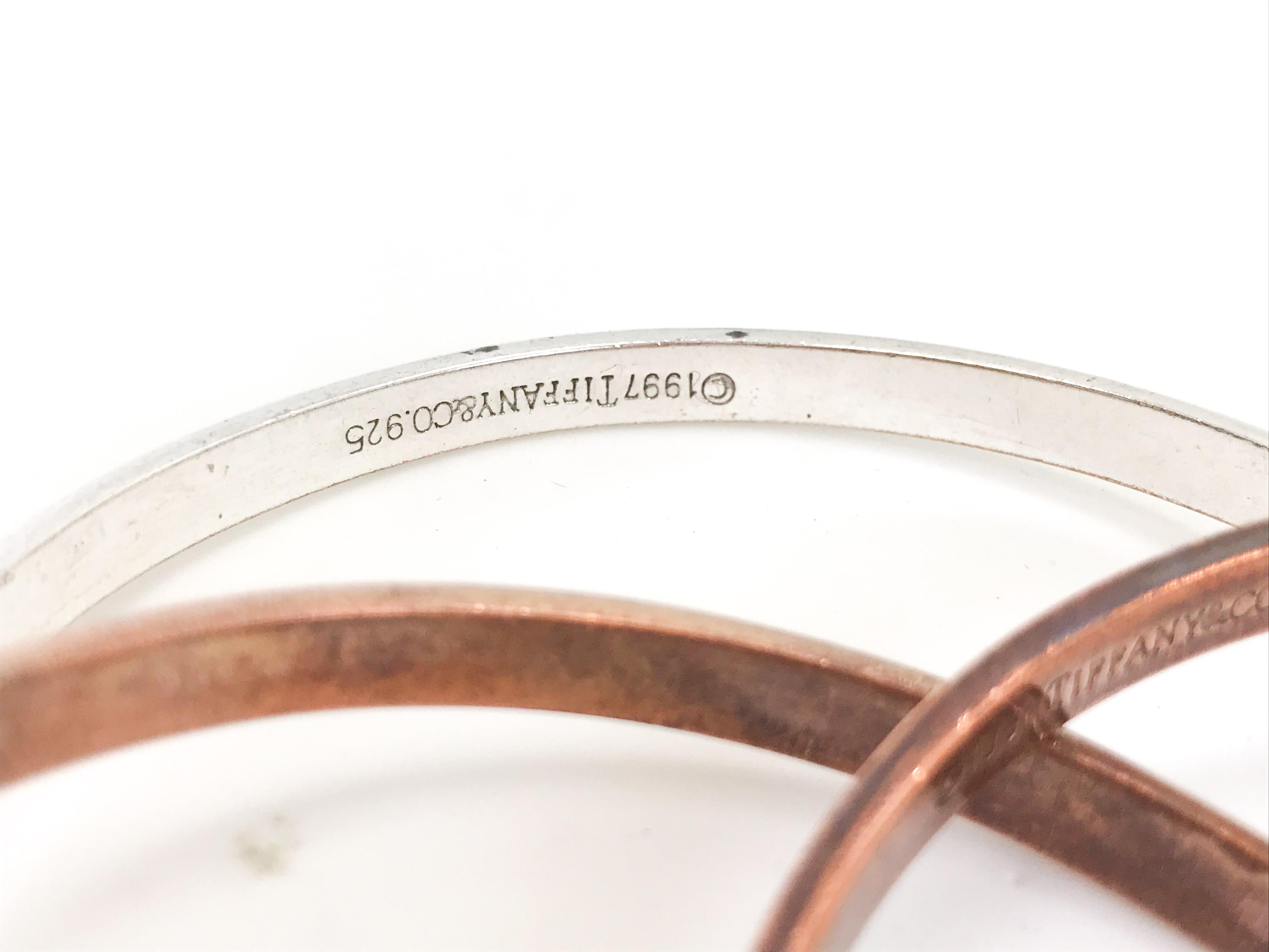 Tiffany 1997 Vintage Sterling Silver Intertwined Bangles. Rare.

Great condition overall. Could do with a clean but I will leave that to the next owner!

One proud owner. Sourced from Tiffany obsessed collector who bought them new in 1997.

Box is