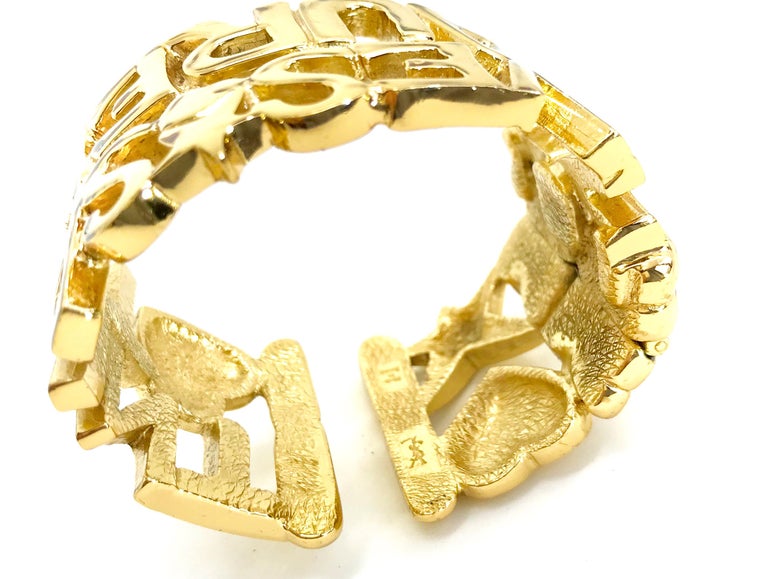 Yves Saint Laurent YSL 90s Vintage Gold Plated Cuff Bracelet at 1stDibs