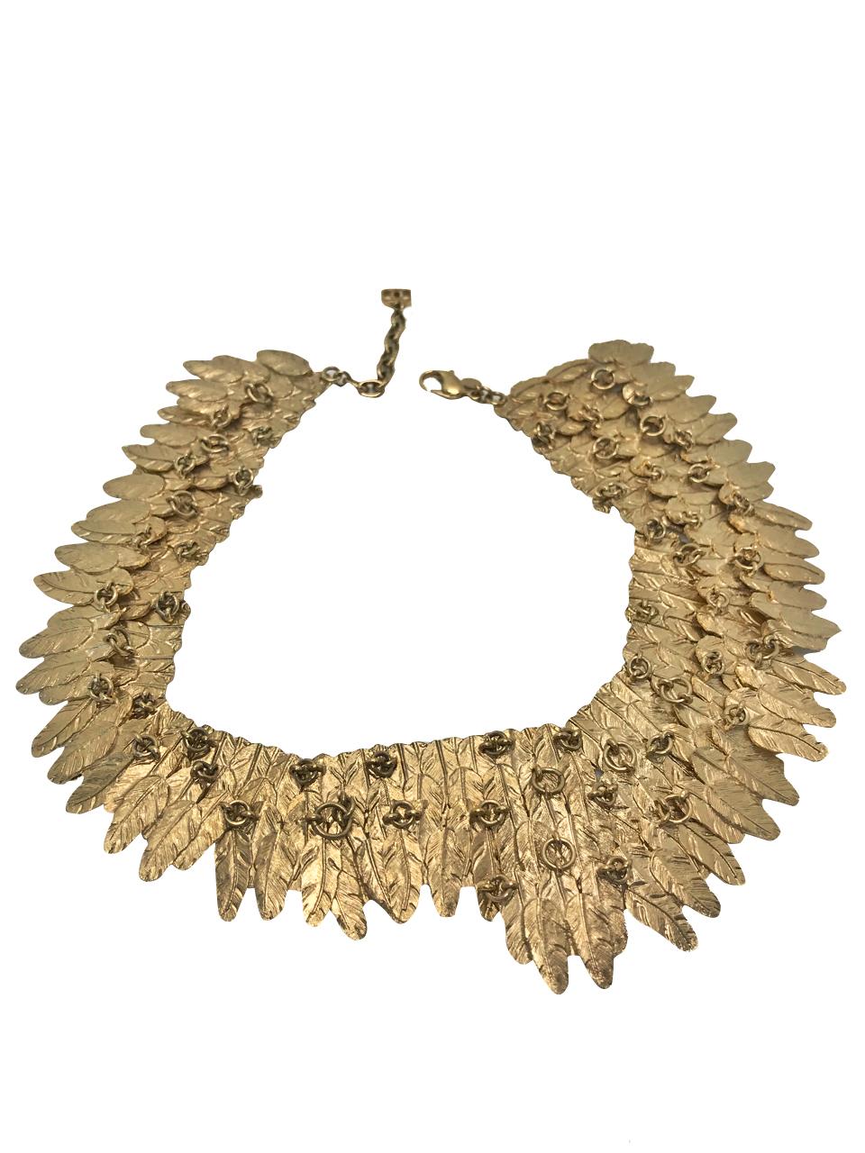 Chanel Feather Collar Choker Necklace.  Made in 2008 for the Autumn Winter collection.  Simply breath taking piece, really difficult to find now.  

Featured in the New York Museum of Art and Design's Exhibition of Fashion Jewellery by Barbara
