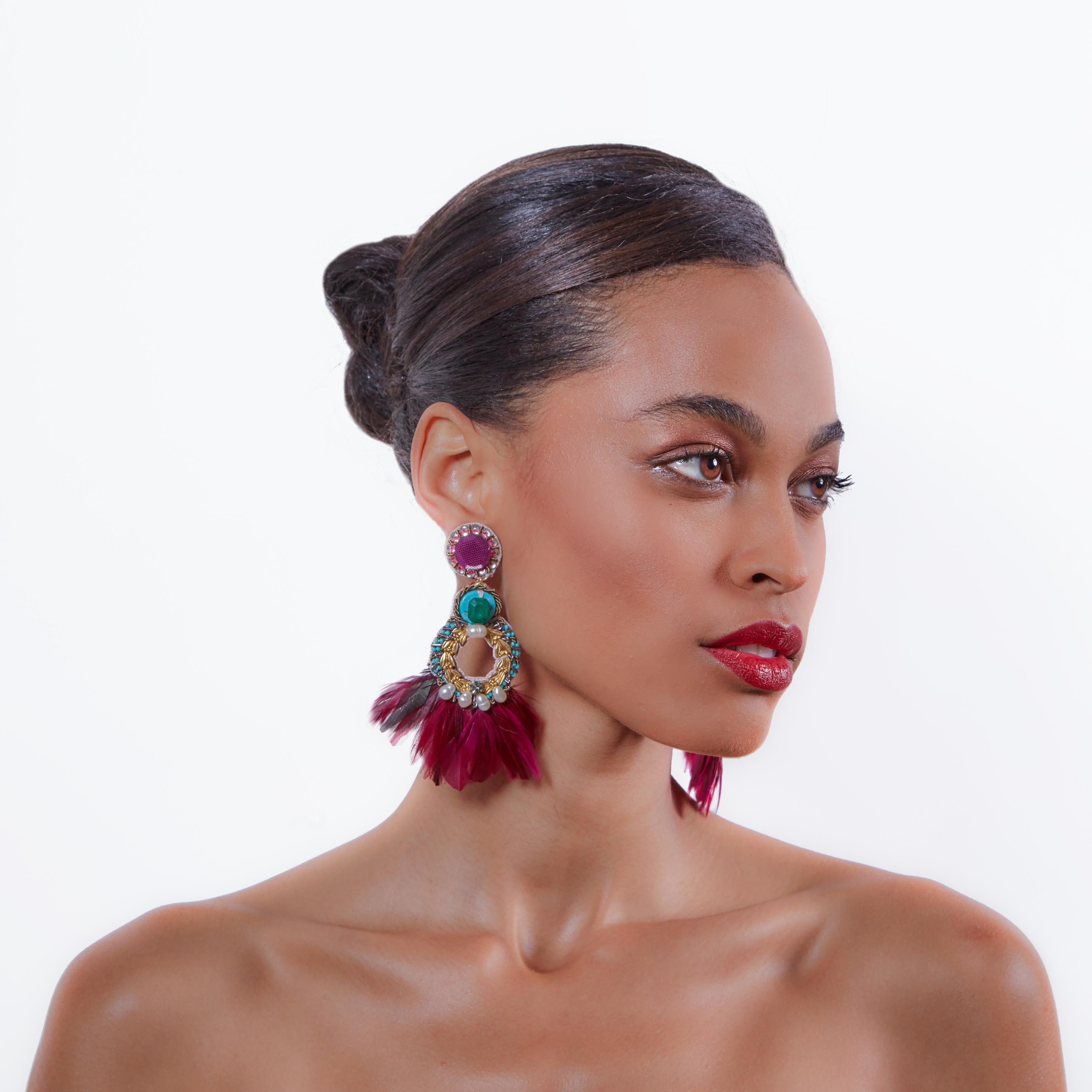 Samba the night away in the Paquetá earring. Coque feathers, Mother-of-Pearl, and crystals make Paquetá a jubilant statement for Fall.