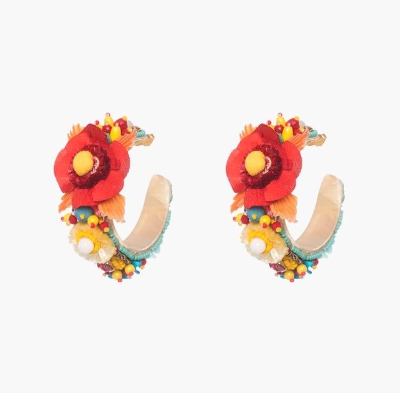 Make a bold statement in the Beleza earring. Bright florals, genuine Raffia, and glass beading make Beleza a fresh update of the classic hoop.