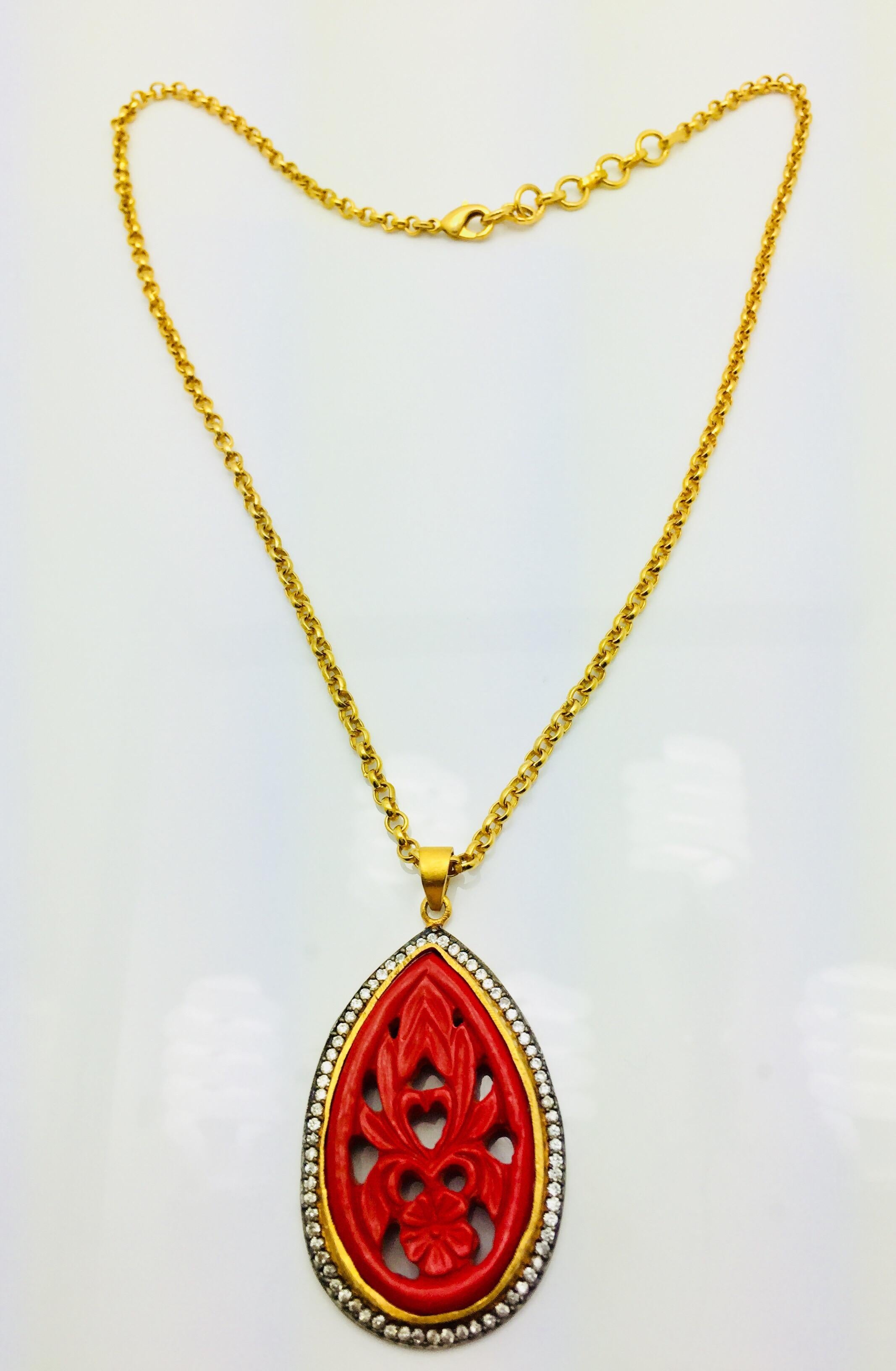 Make a statement with this hand carved red resin necklace. Artfully crafted, these gorgeous carved necklace is enhanced with cubic zircon.  Chain length 18 inches.  
More color options available as well.

FOLLOW  MEGHNA JEWELS storefront to view the