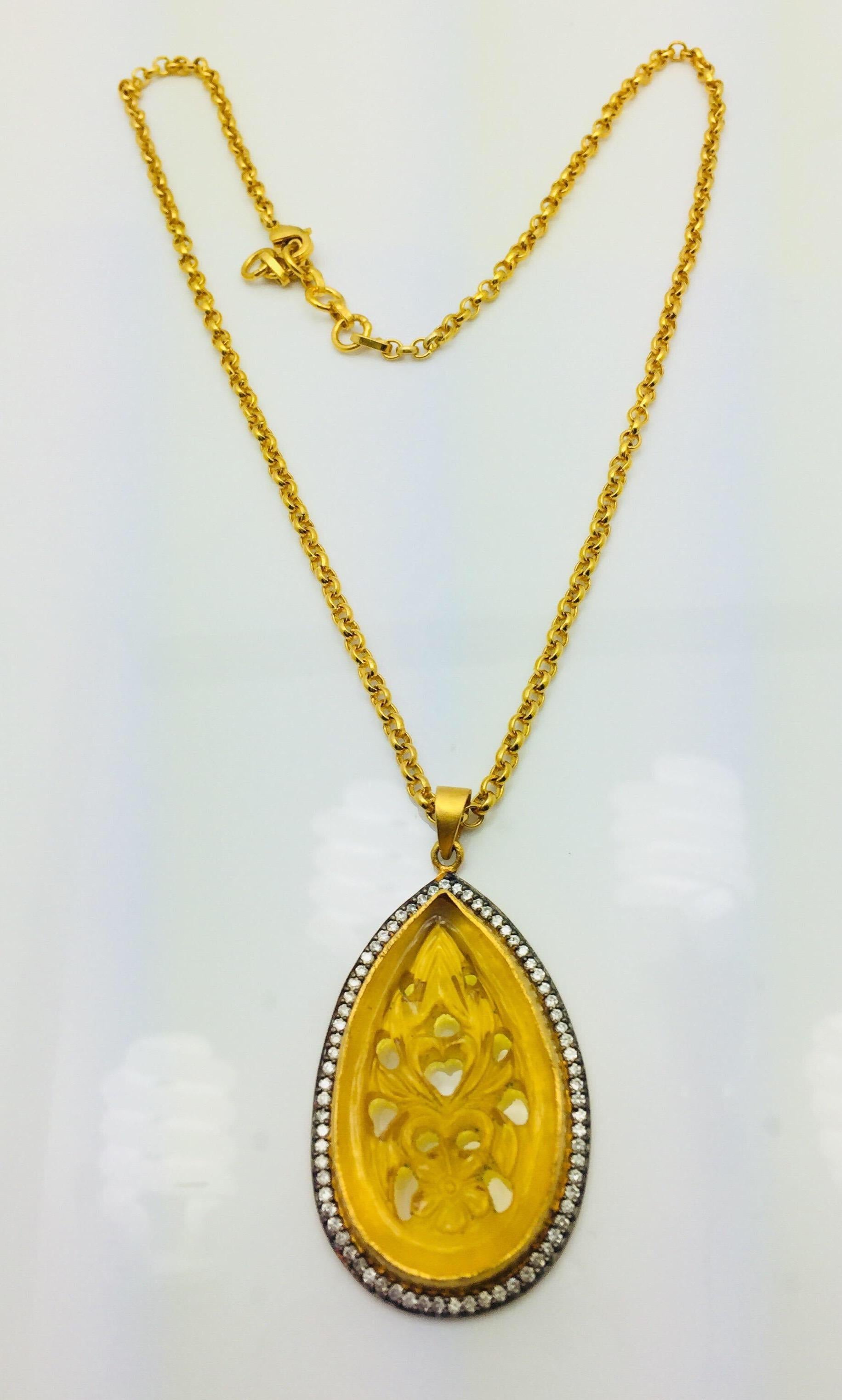 Make a statement with this hand carved resin golden amber necklace. Artfully crafted, these gorgeous carved necklace is enhanced with cubic zircon.  Chain length 18 inches.  More color options available as well.

FOLLOW  MEGHNA JEWELS storefront to