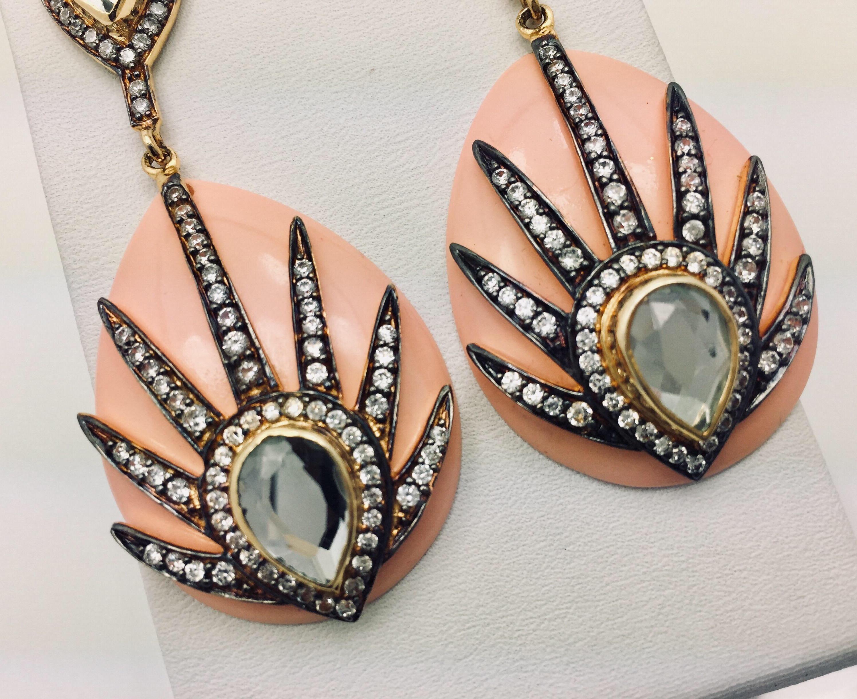 Pair these gold, peach and CZ Mohawk earrings with jeans, a sundress or your favorite evening attire... whatever you choose, be prepared for the many oohs' and ahhs these gorgeous earrings are sure to evoke! The beautiful peach colored background