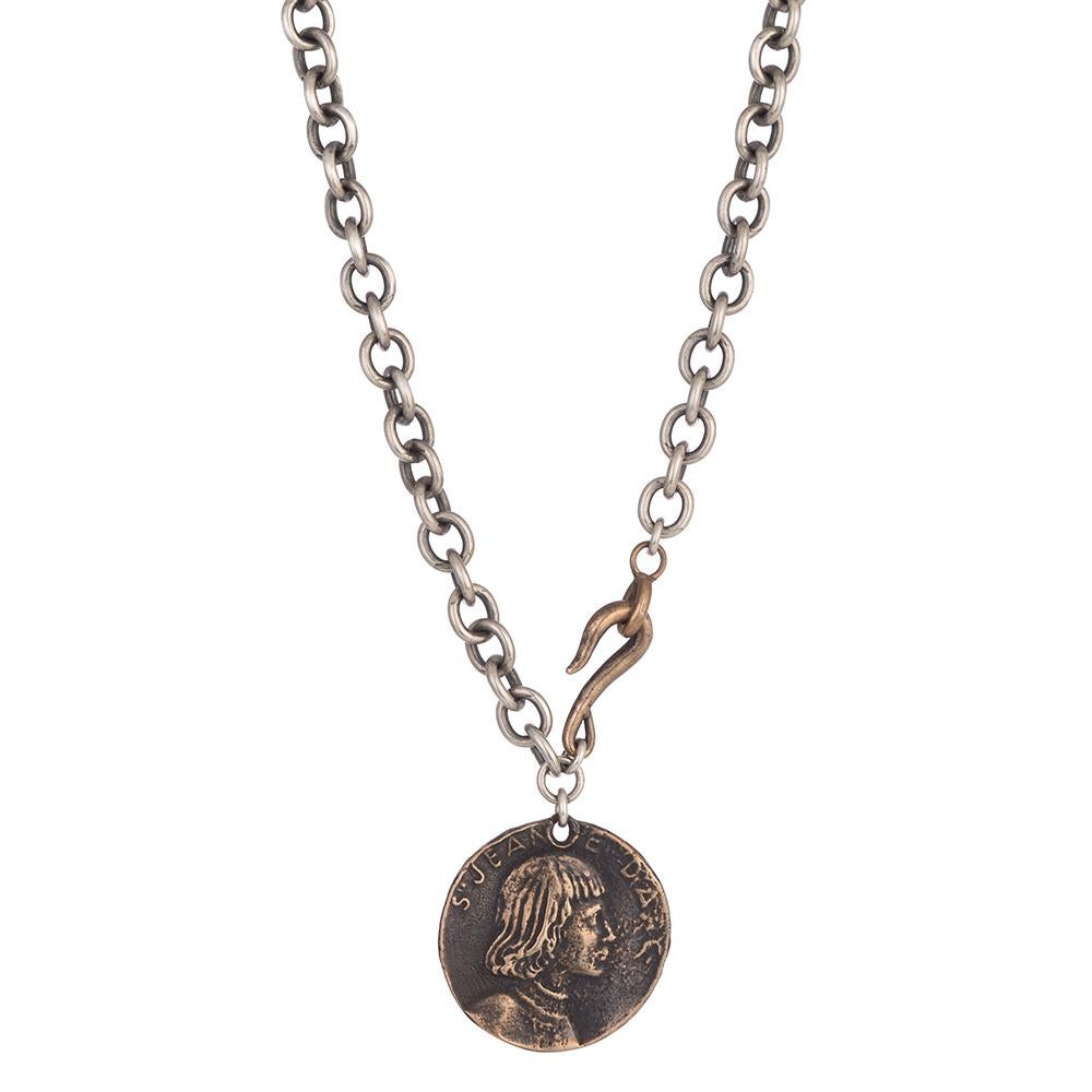 - Handmade Joan of Arc Necklace by Shannon Koszyk
- Solid sterling chain and bronze Joan of Arc art medal
- Features Joan's armory crest
- sword with royal crown and two fleur-de-lis
- Written in Old French
- The coin says 