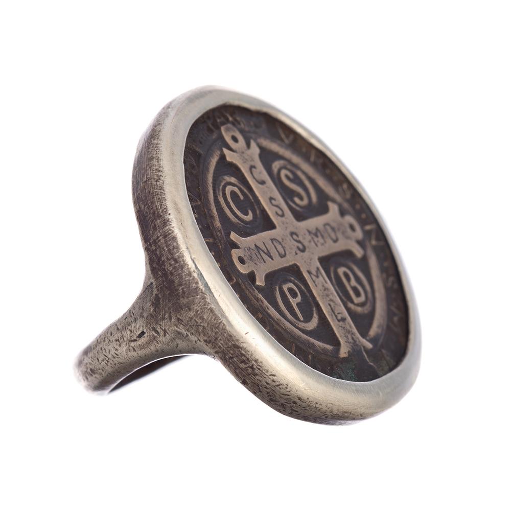 Saint Benedict Ring made by Shannon Koszyk.  Sterling wrapped bronze St. Benedict coin, available in sizes 7-10, whole sizes only.  Rings are made to order, please allow 4-6 weeks, Custom sizing available, 50.00 custom fee applies.  All handmade in