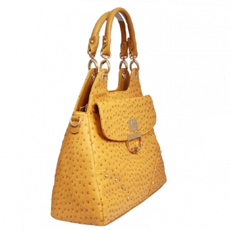 - Front pocket with flap closure
- Embellished with logo Plate hardware
- Single zippered main compartment
- Gold toned customized hardware
- Custom lining
- available in 6 different colors 