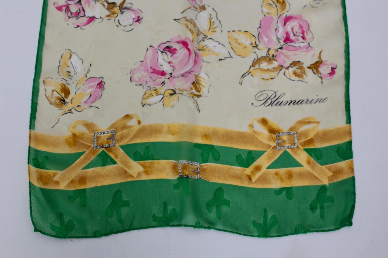 This presented silk scarf by Blumarine from the 1990s was designed like an aquarell painting and shows delicate flowers and bows.

The scarf was made of 100% silk and is in very good condition with minor signs of age and use.
It is professionally