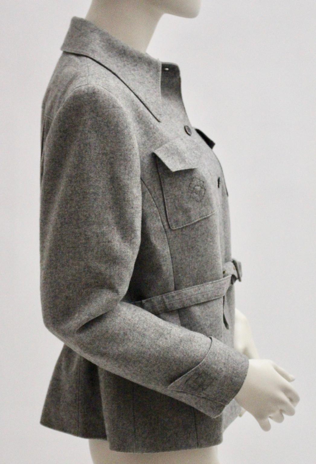 This grey woolen safari-style jacket was designed and made by Herbert Schill, Vienna 1960s.
Herbert Schill was the assistant of the very popular designer Fred Adlmüller in Vienna.
His atelier was located in the 1st district of Vienna,