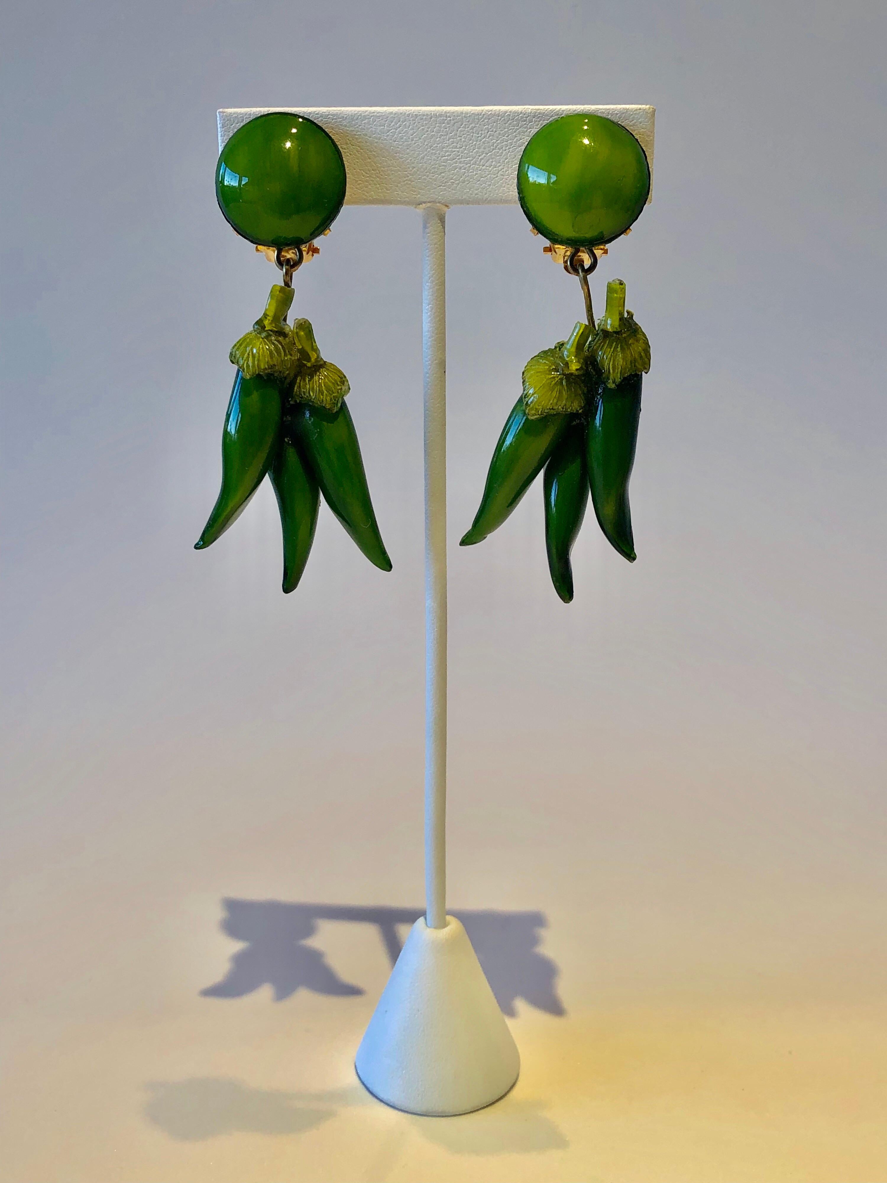 Bold green chili pepper clip-on statement earrings handcrafted in Paris France by Cilea - the earrings feature a cluster of three enameline (enamel and resin) chili peppers. Lightweight and comfortable, signed Cilea Paris on the back.