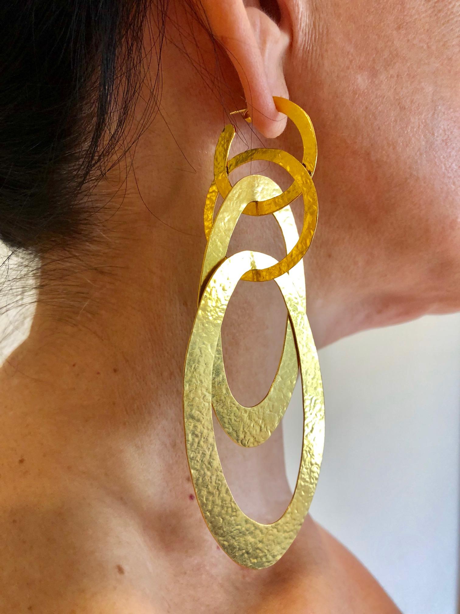 Stunning fashion-forward Parisian statement earrings!  Unique creativity and design mean handcrafted quality in geometric harmony by a Parisian hand in the Marais. The geometric pierced earrings are comprised out of four lightweight hammered