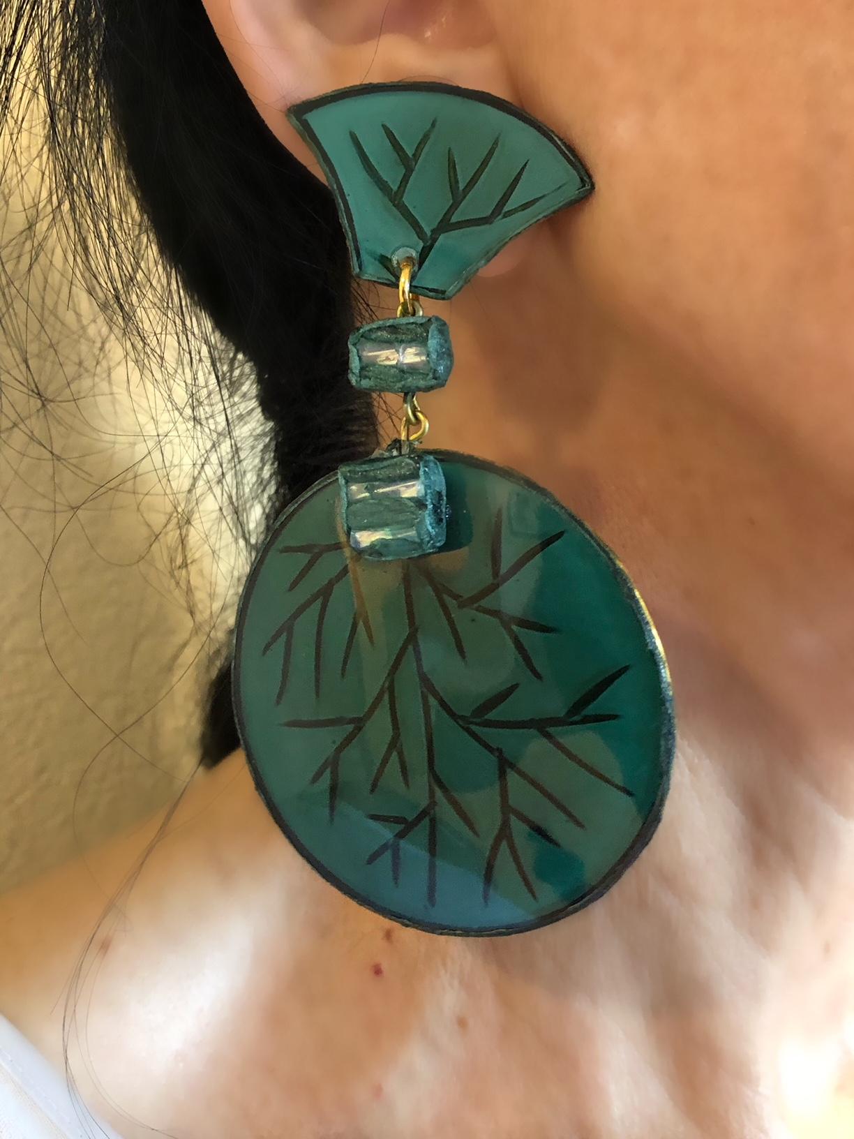 green statement earrings