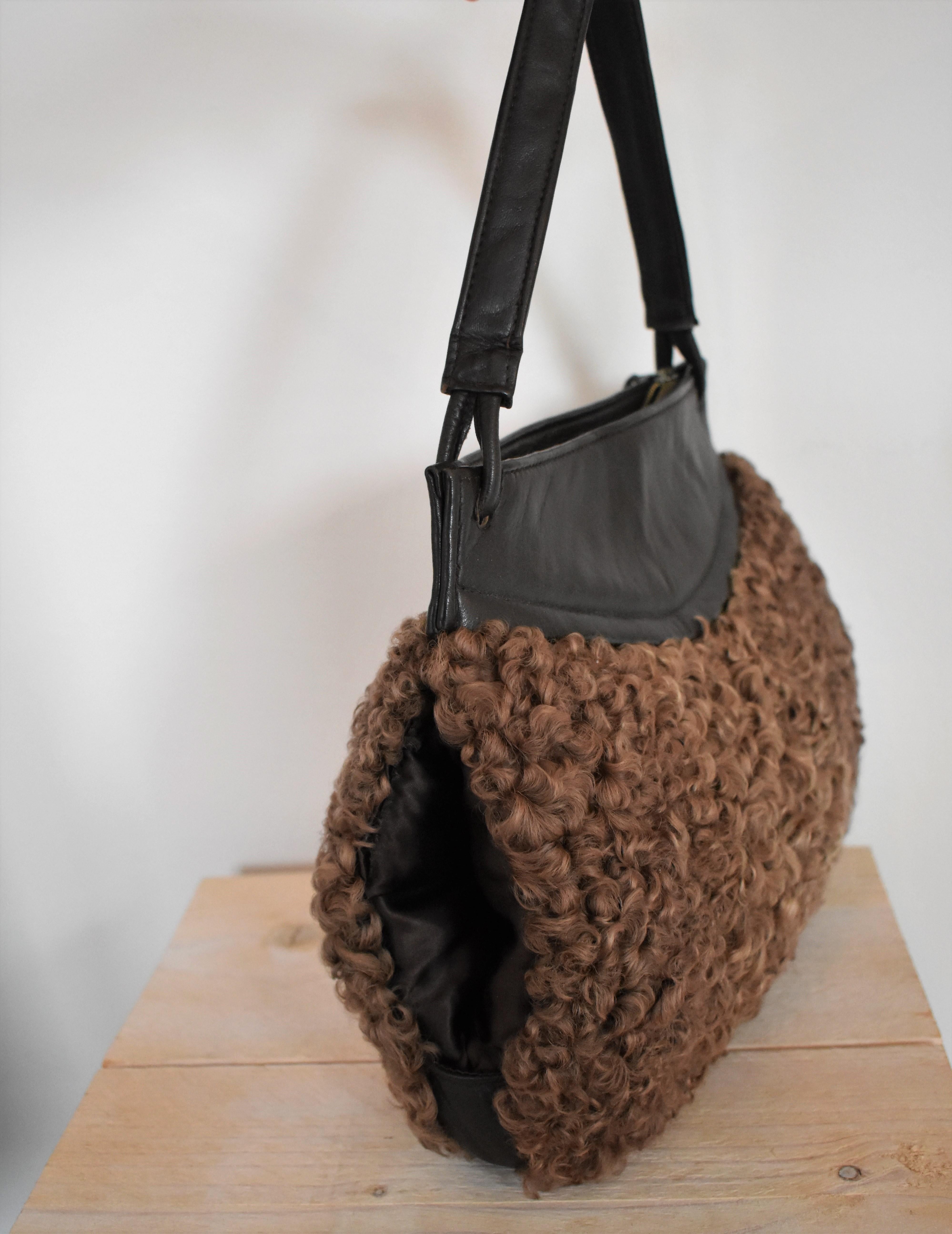 Vintage Astrakhan Lamb Fur and Leather Muff Bag In Good Condition For Sale In Amsterdam, NL