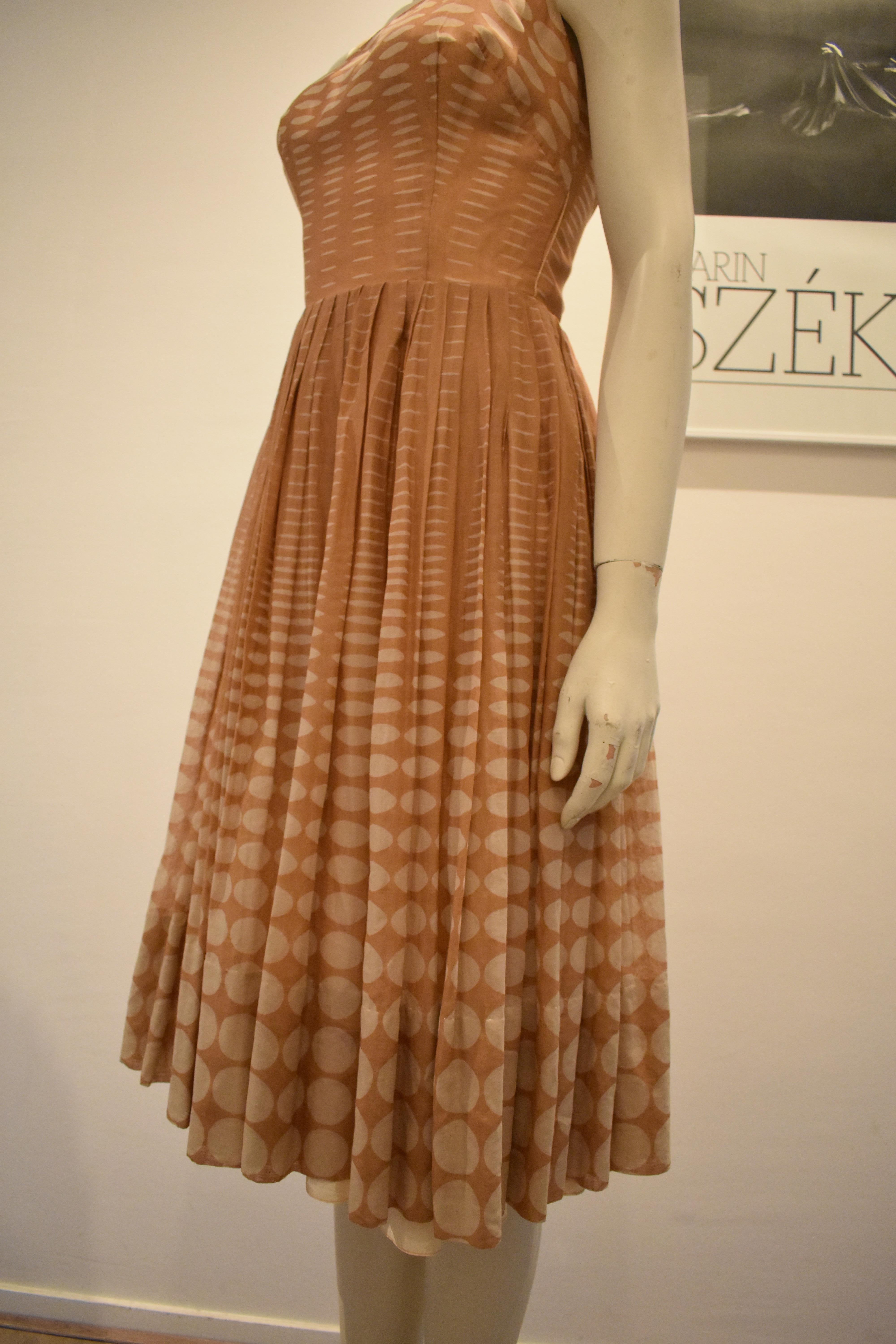 Vintage 1950s Batiste Handmade Dress with a Flowy Pleated Skirt In Good Condition For Sale In Amsterdam, NL