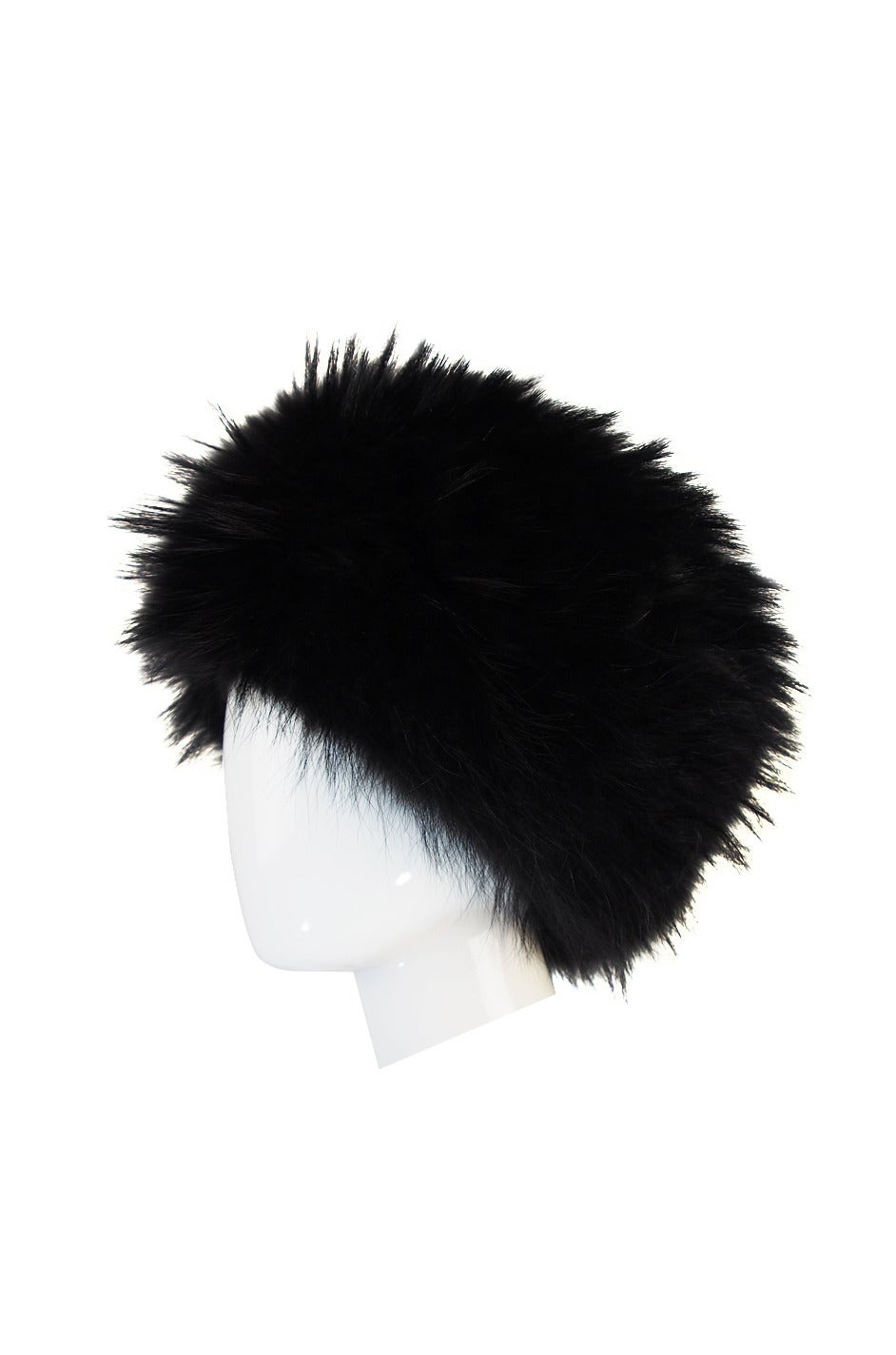 This hat is such a statement piece and so bold! Made of a glossy Marmot pelt that has two length of fur giving it that wonderful fullness. It looks to be unworn and because of the basic beanie style you can wear it numerous ways - to the side,
