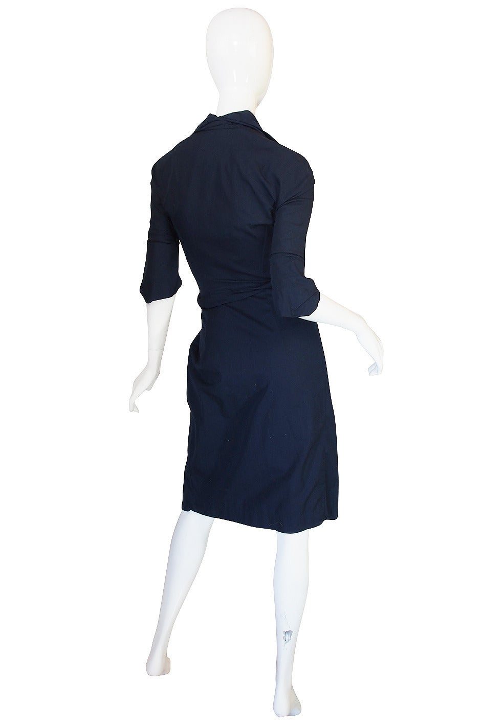 This lovely little blue cotton dress by Vivienne Westwood is just fantastic and will easily stand the test of time. I love the sexy hourglass silhouette it has and the detailing on it is fabulous. It is made from a 100% cotton mix that makes it