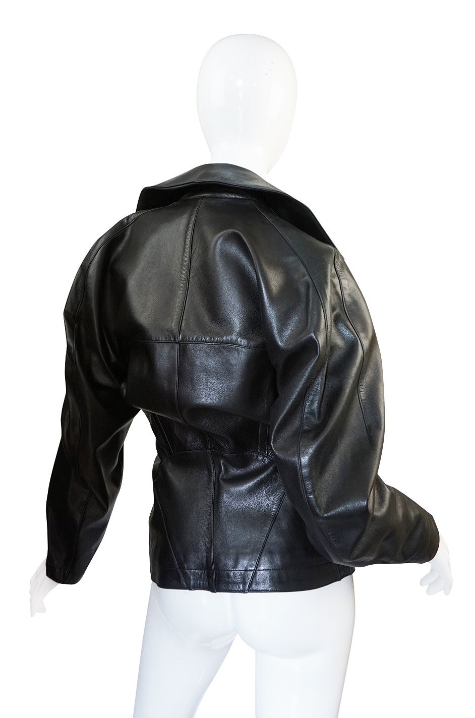 I don't think there has been a season more appropriate to bring this amazing little Azzedine Alaia black leather jacket back to life in. It is the perfect topper to just about anything and will add that chic and sexy edge to any outfit. Azzedine is