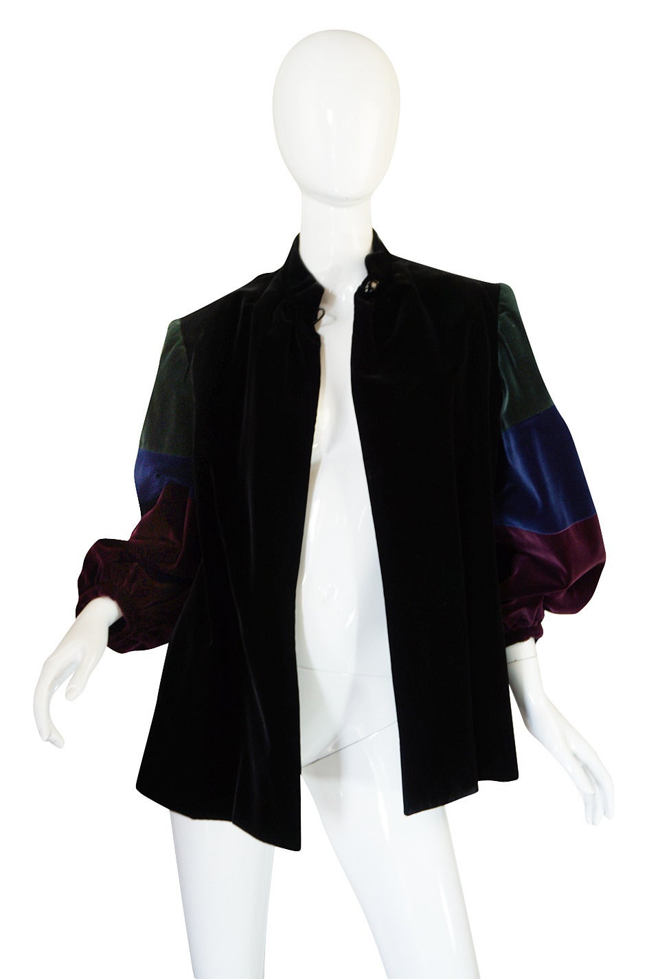 I adore this great little Yves Saint Laurent jacket made of a luxurious black cotton velvet. The cut is loose and easy and reminds me a bit of a painter's smock with a nod to the renaissance. The sleeves are absolutely jaw dropping. Each is cut wide