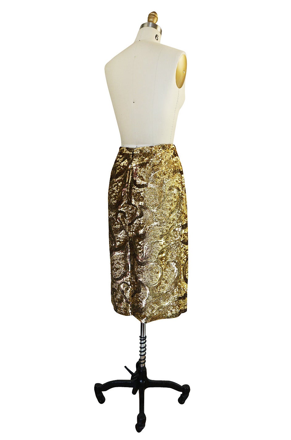 If you have been looking for that perfect statement skirt, look no further as this may well be it. From the 2014 Resort collection this muted gold, hammered sequin covered skirt is fantastic. Style dot com said of this collection:

