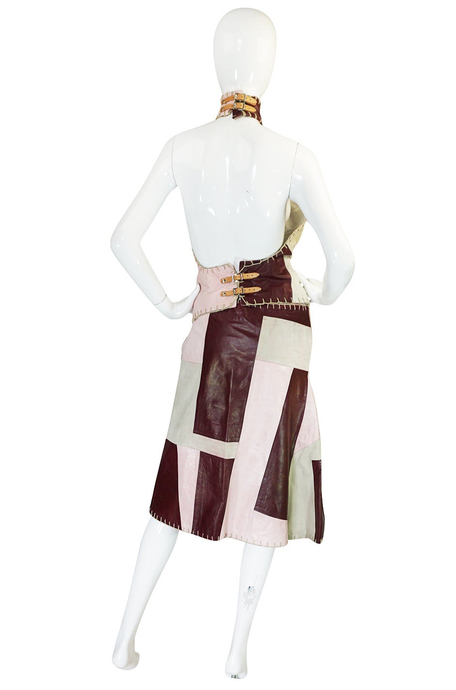 Runway pieces have become iconic and shockingly rare. This extraordinary patchwork leather set is from the Spring Summer 1999 collection. McQueen's 1999 Spring/Summer collection was untitled so is simply referred to as 